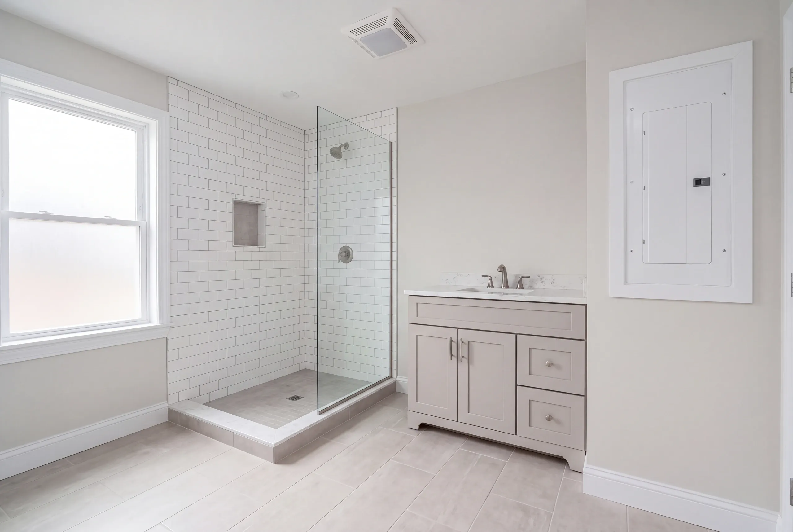 Undersized service panel replaced during an Auburn bathroom renovation