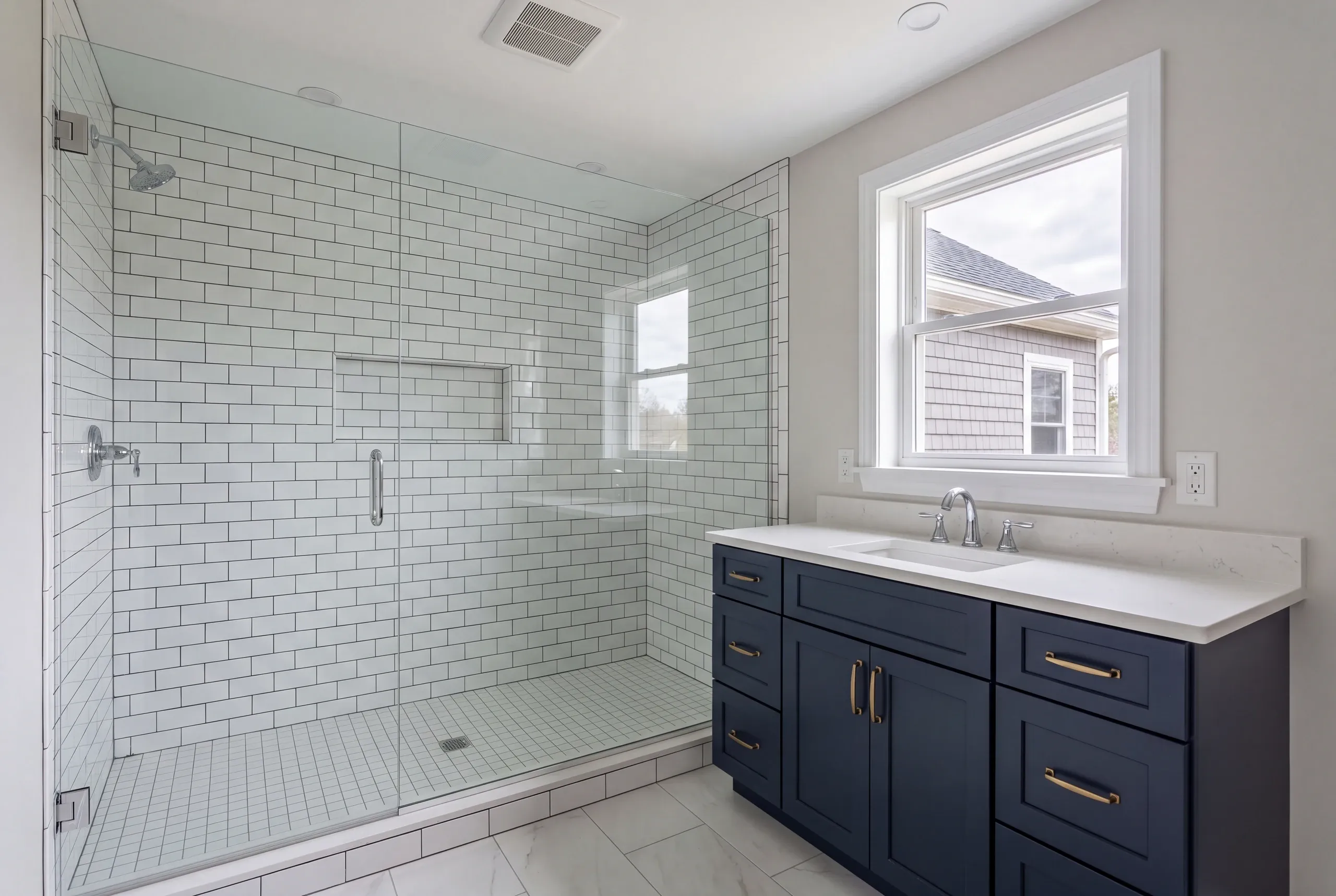 Bathroom remodeling Augusta, ME project with a new tiled shower and semi-custom vanity