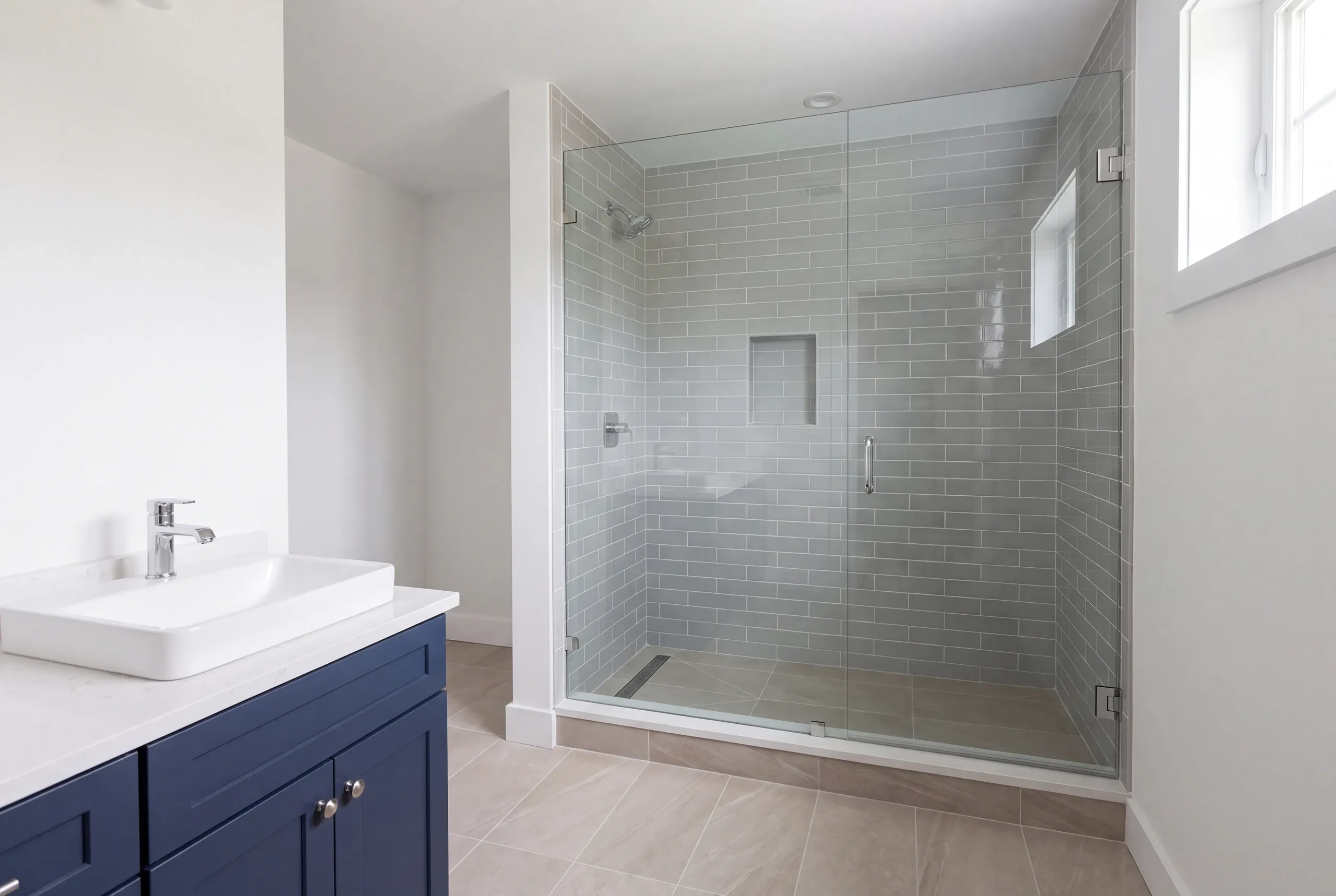Finished bathroom in a Brunswick, Maine home, wide interior view
