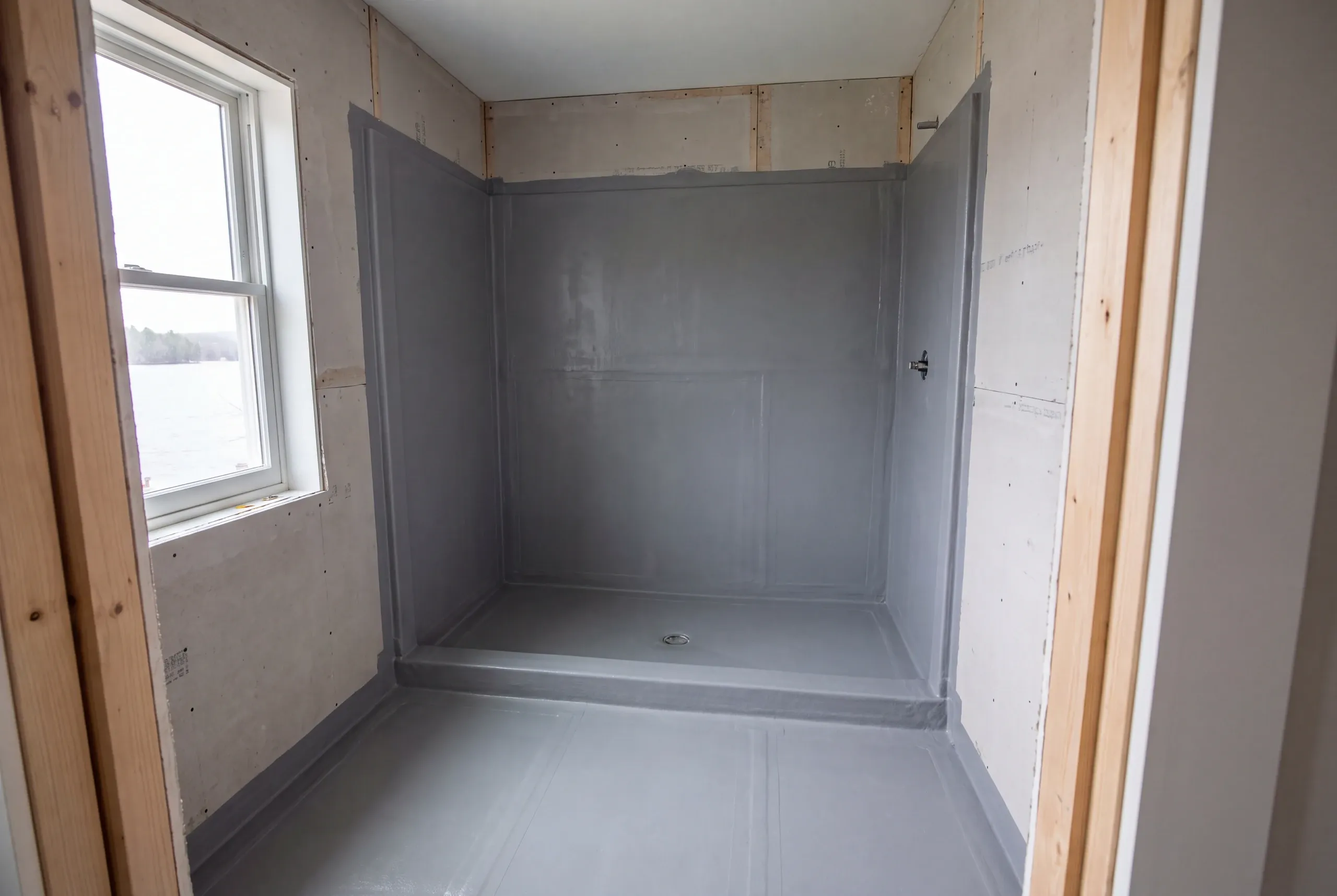 Waterproofing membrane installed before shower tile in a China home