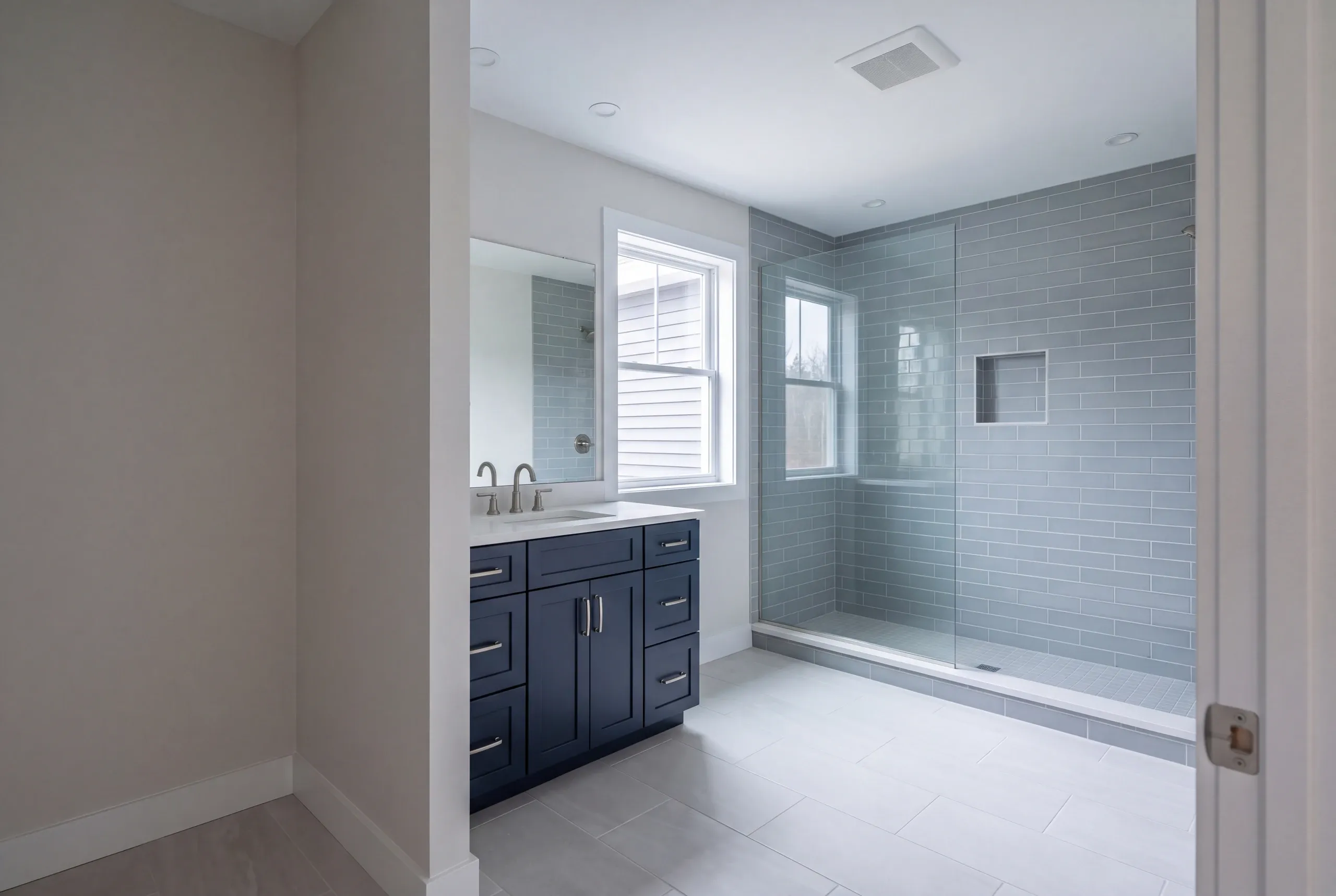 Finished bathroom in a China, Maine home, wide interior view