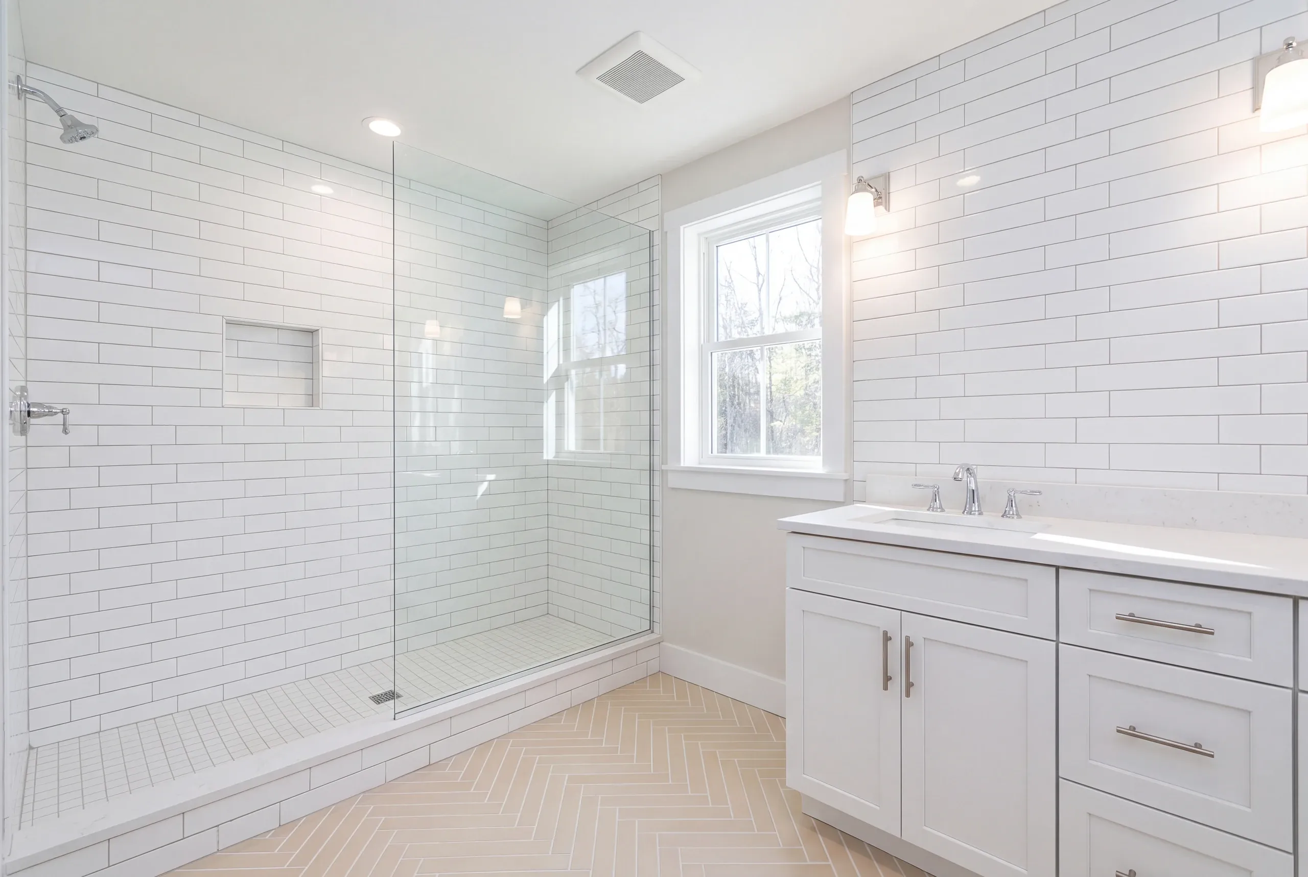 Layered flooring from three decades removed in a Clinton bathroom