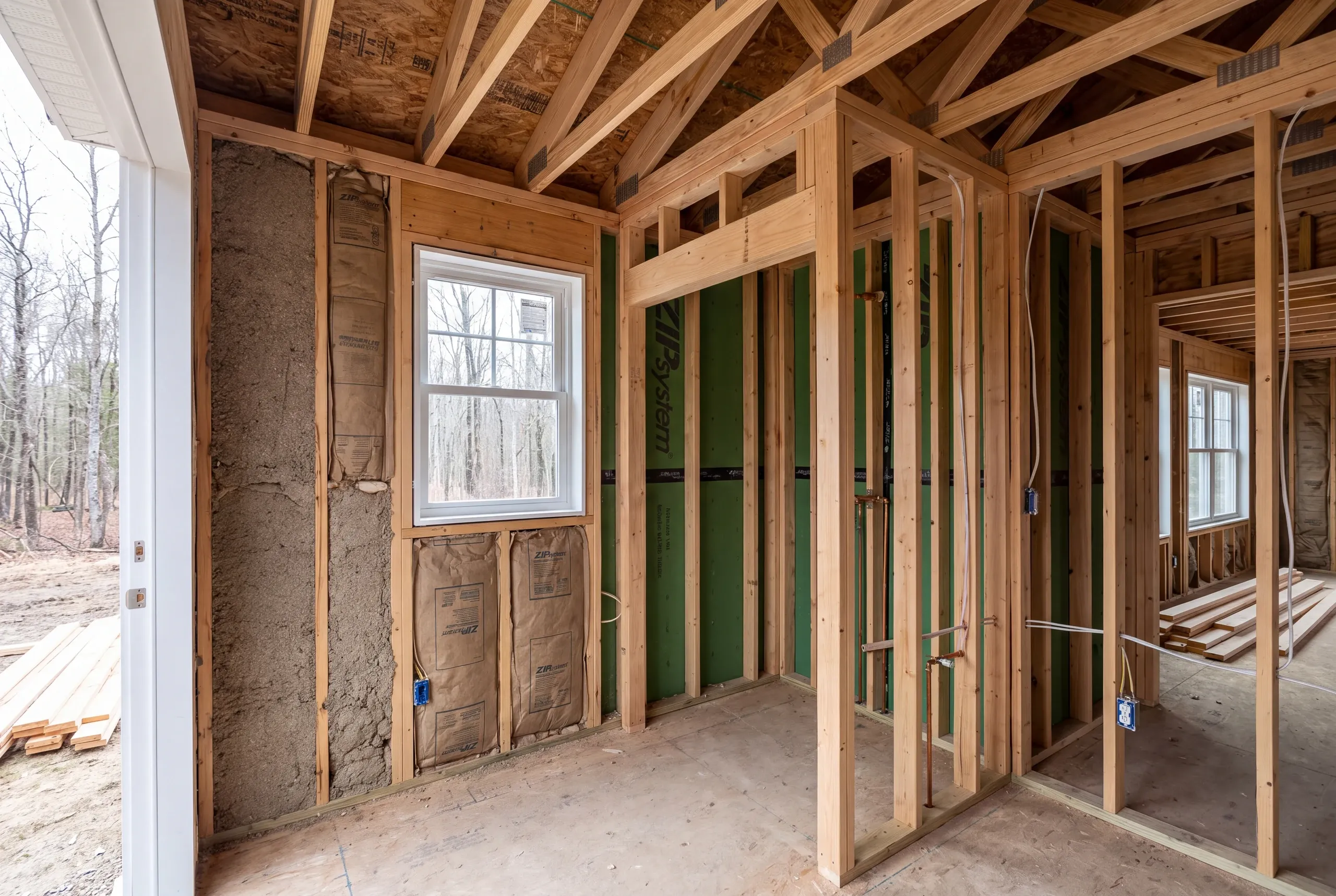 Insulated exterior bathroom wall detailed for a cold northern Kennebec winter