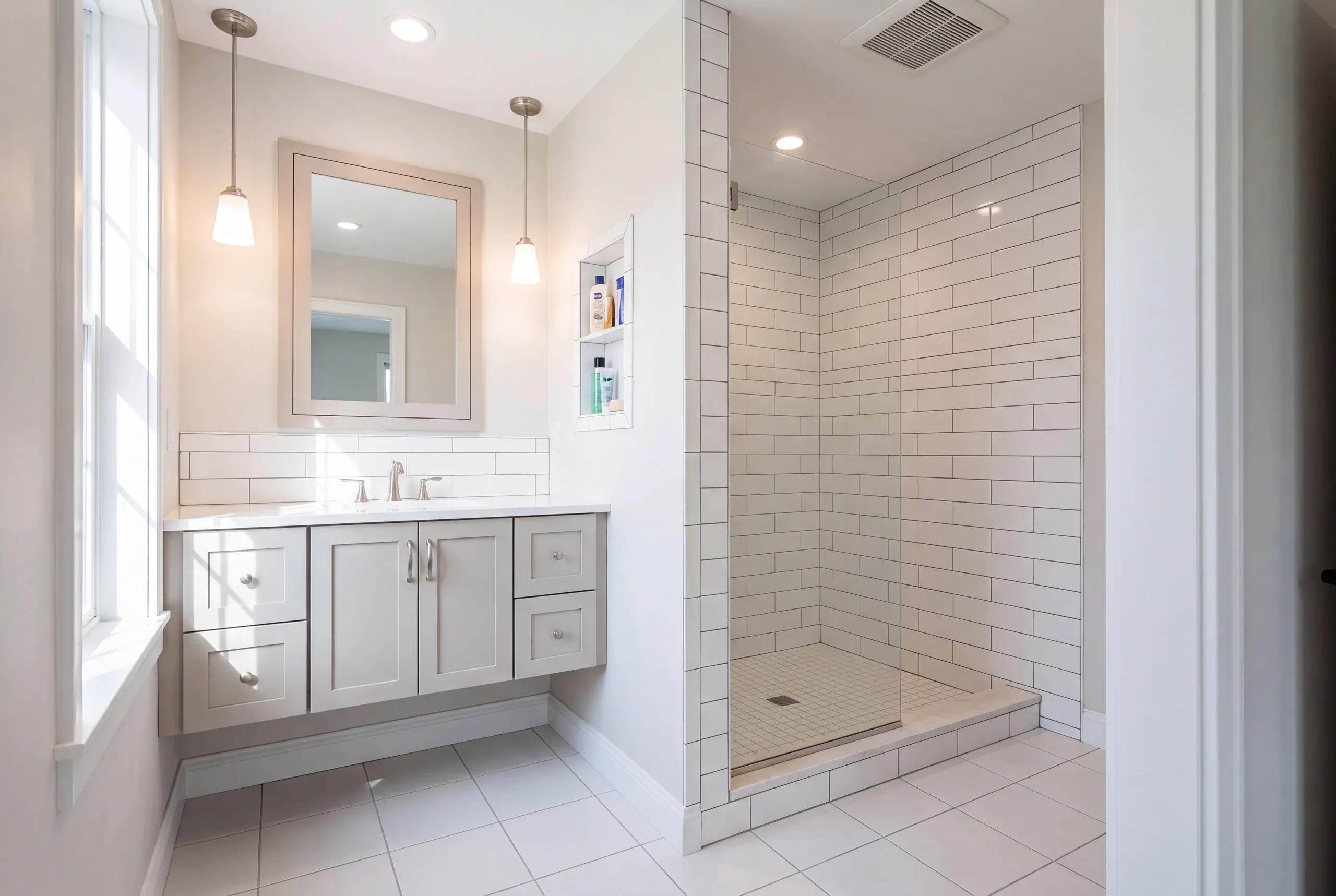 Finished Clinton bathroom with the vanity and tiled shower in view