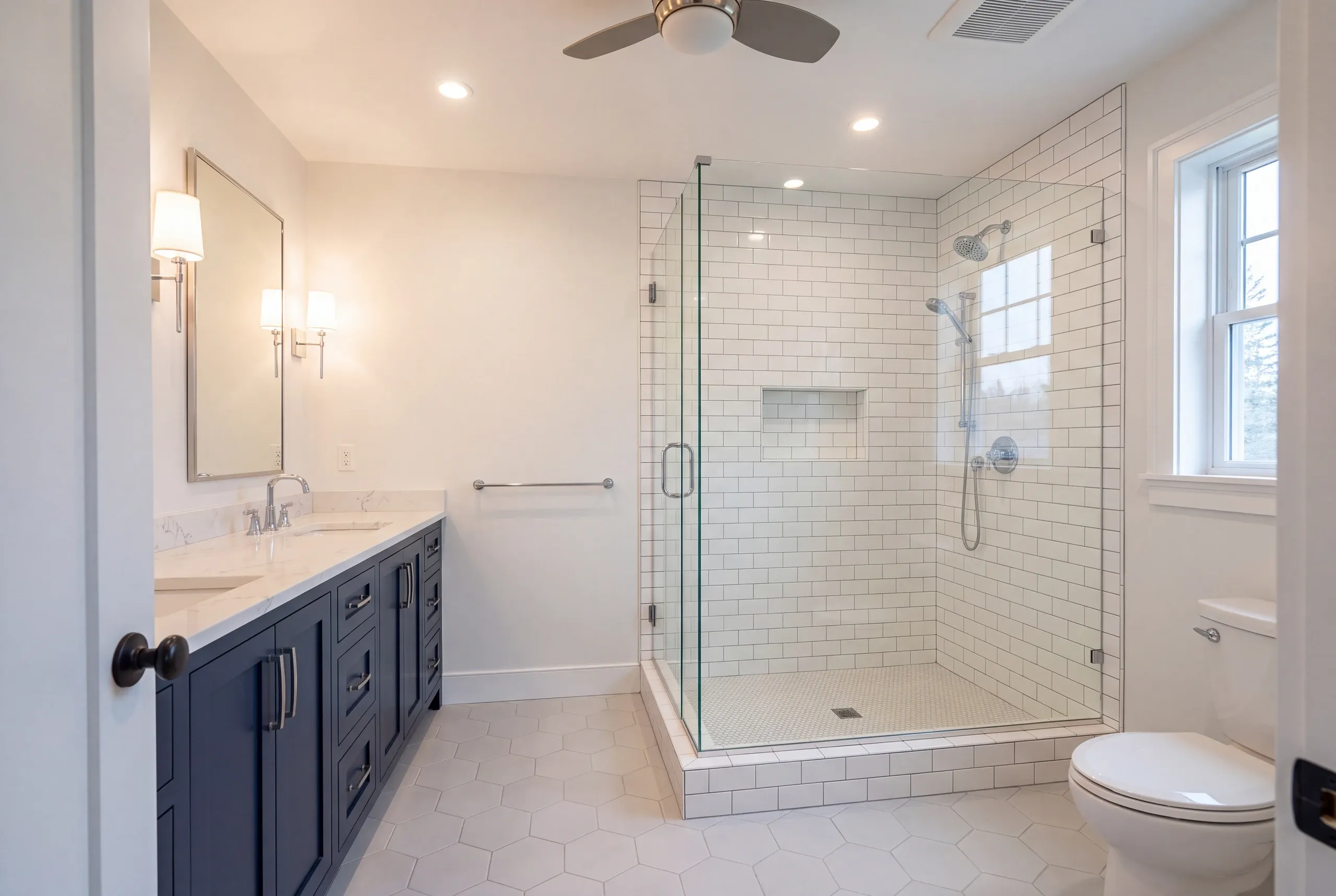 Finished bathroom in a Clinton, Maine home, wide interior view