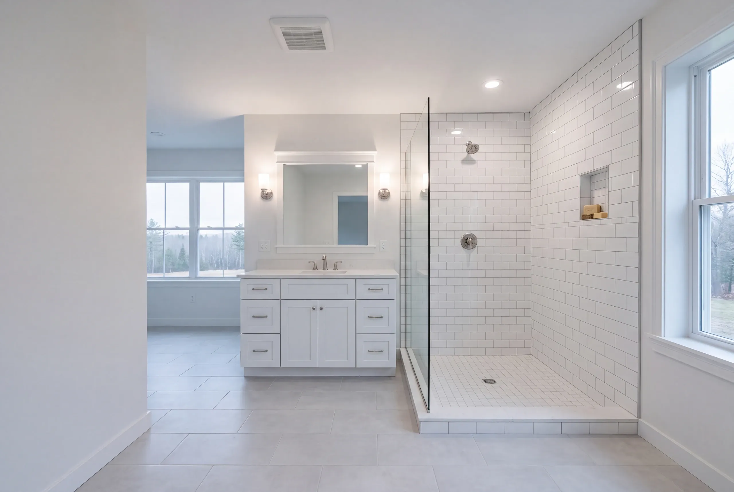 Finished bathroom in a Central Maine home, wide interior view