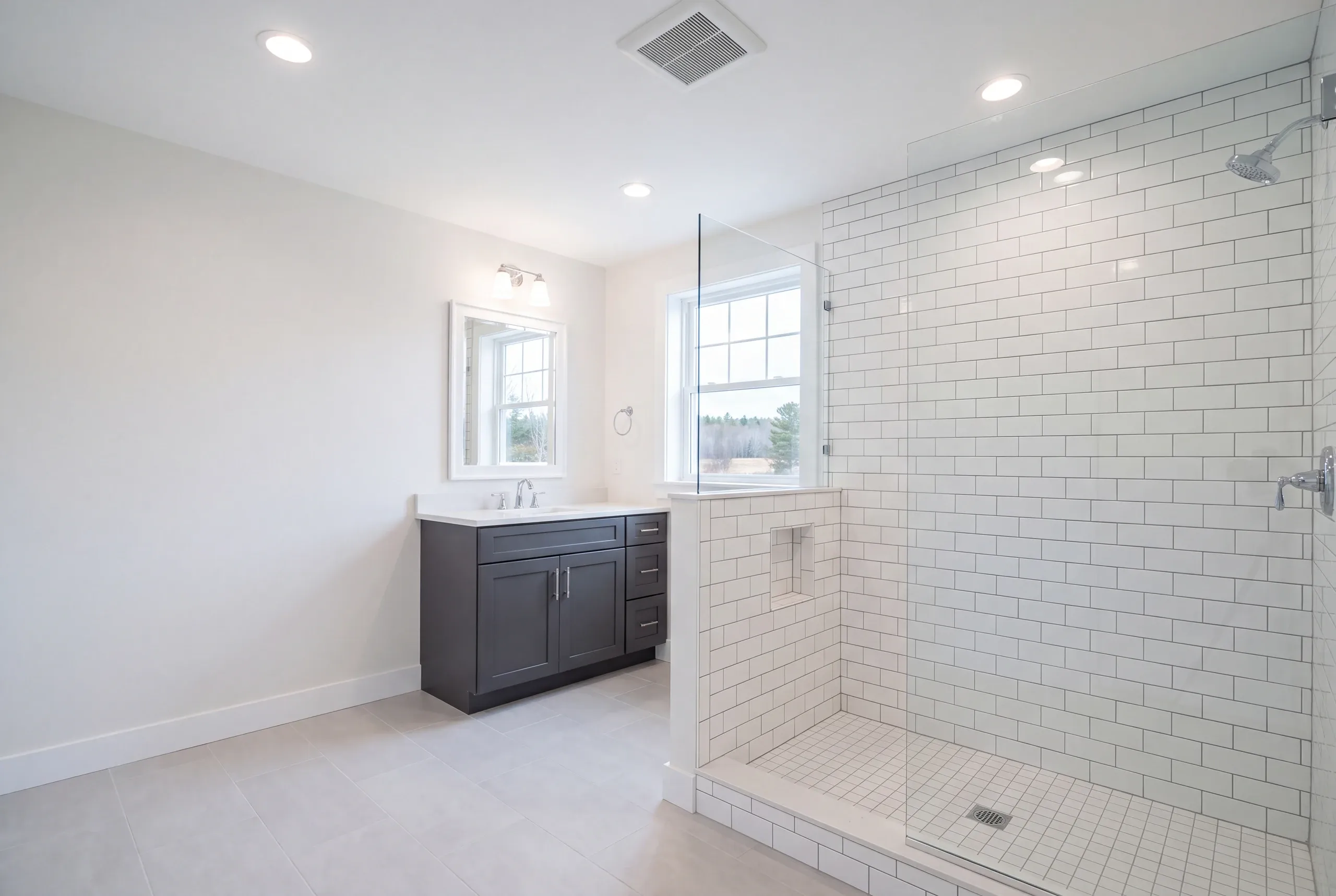 Finished bathroom in a Fairfield, Maine home, wide interior view