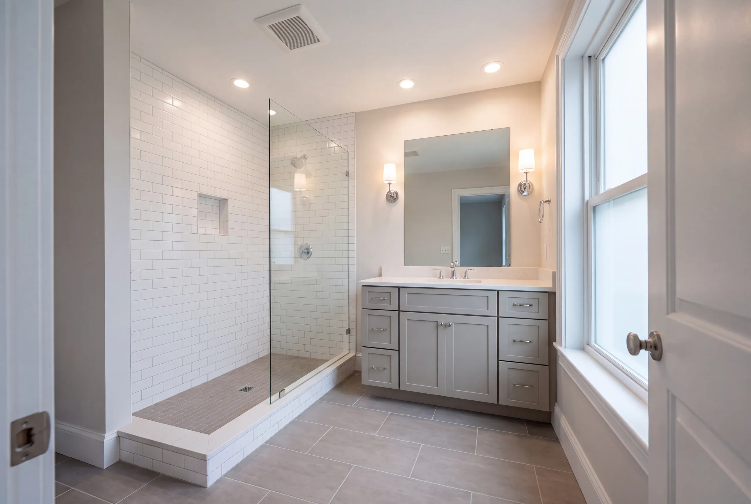 Finished bathroom with heated tile floor in a Farmington hillside home