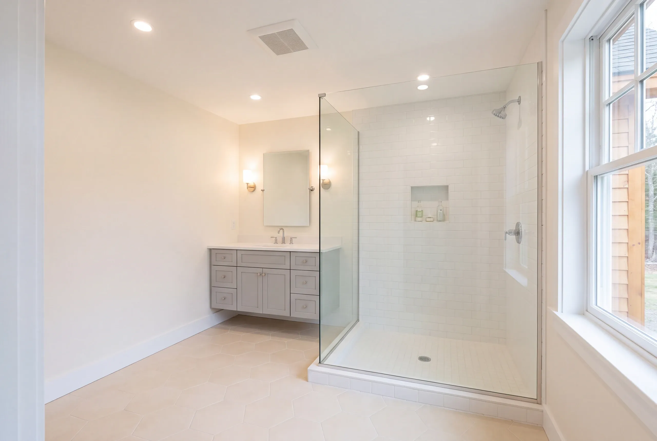 Finished bathroom in a Farmington, Maine home, wide interior view