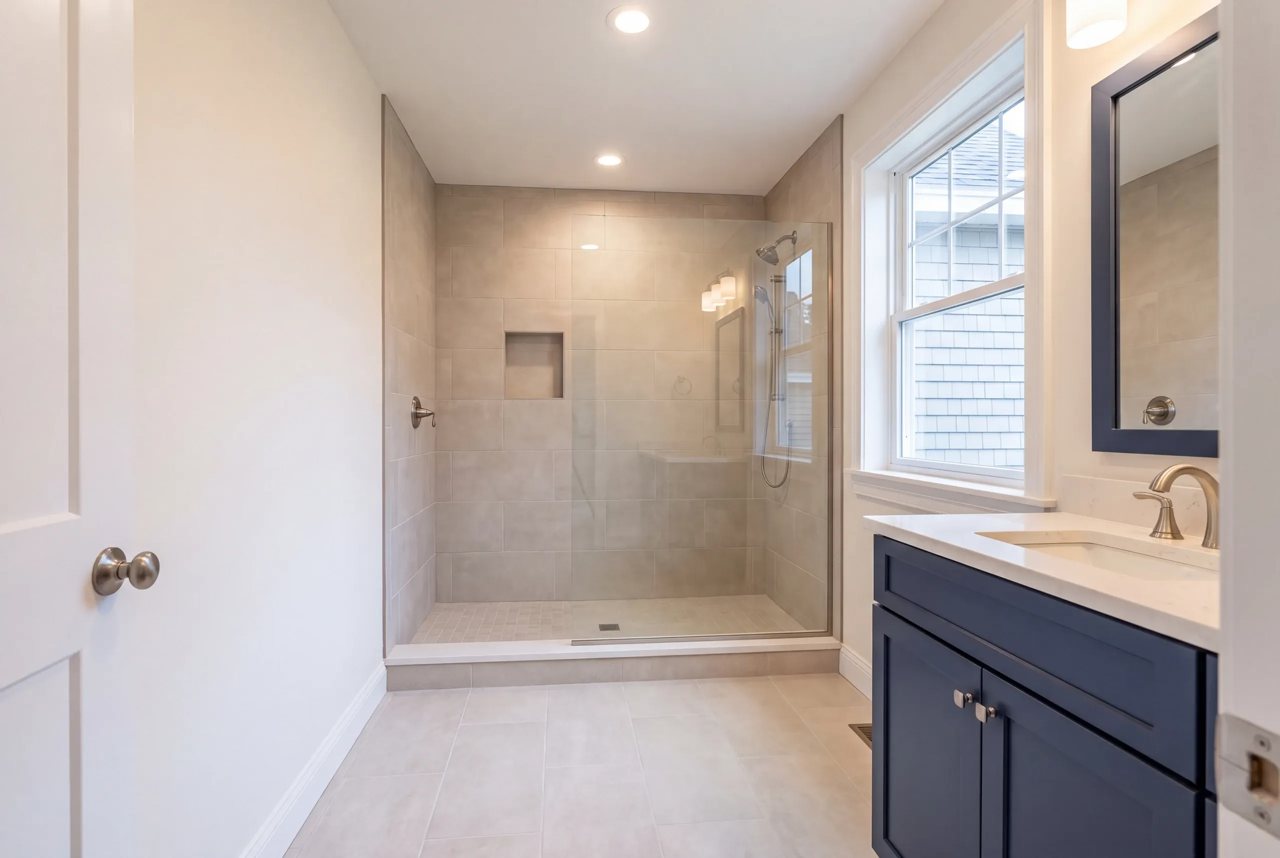 Finished bathroom in a Greene, Maine home, wide interior view