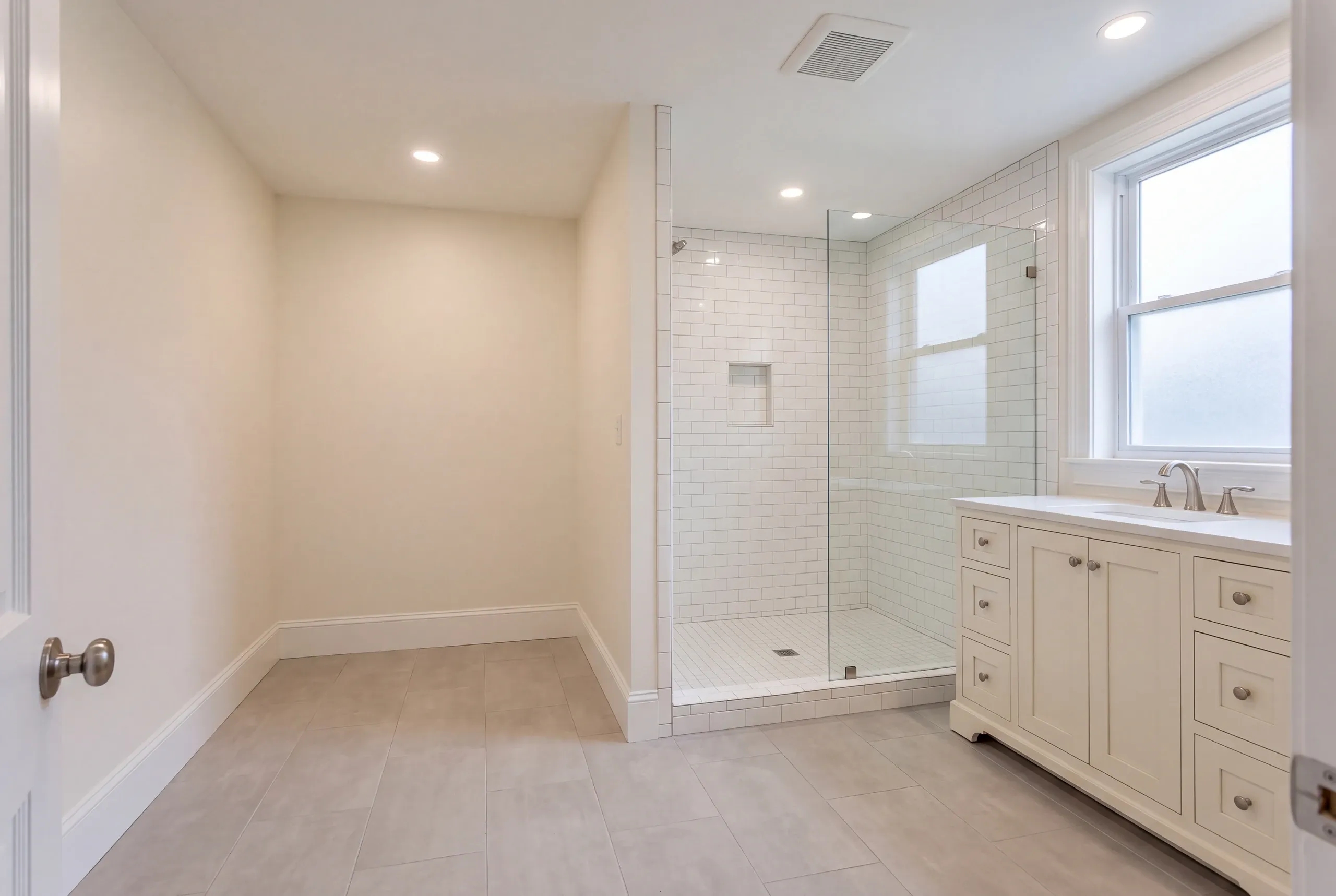 Finished bathroom in a Lewiston, Maine home, wide interior view