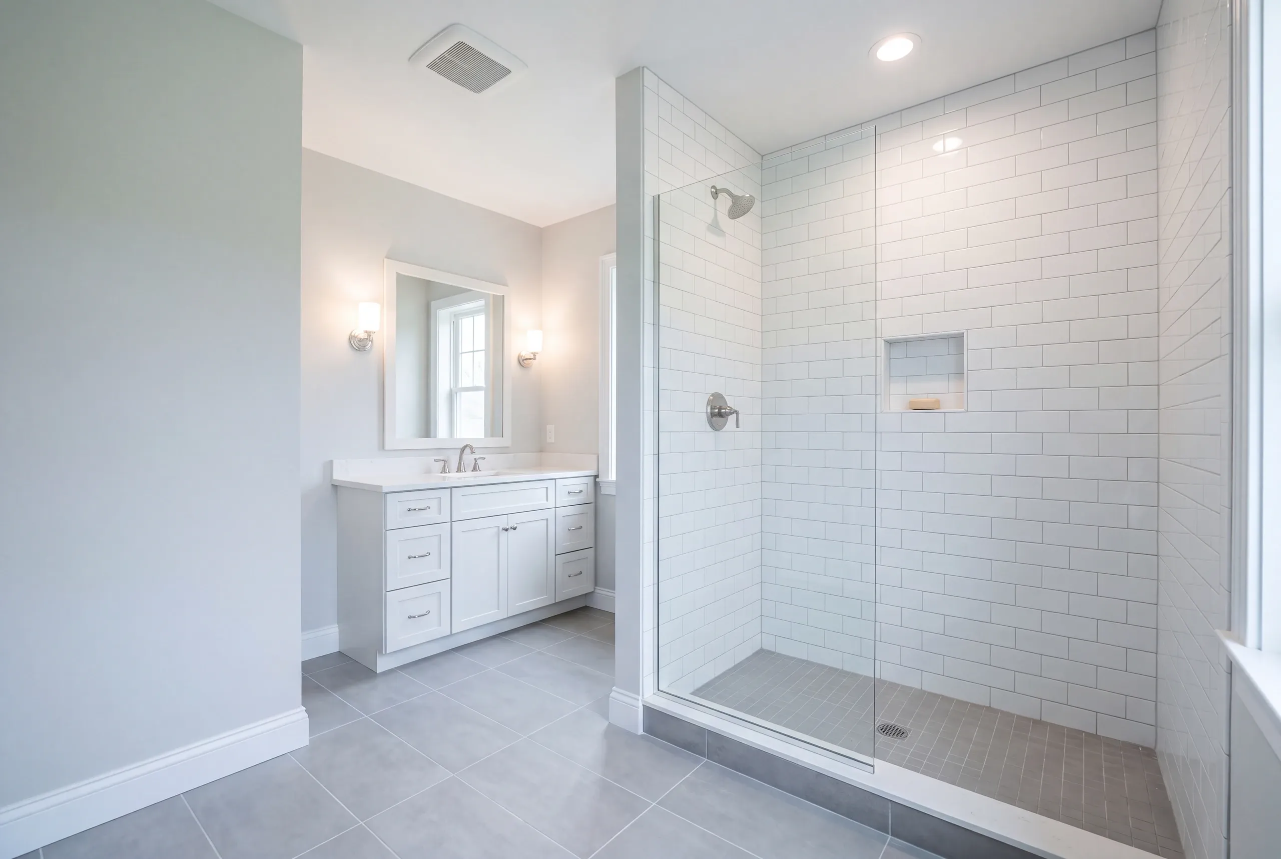 Finished bathroom in a Mt Vernon, Maine home, wide interior view