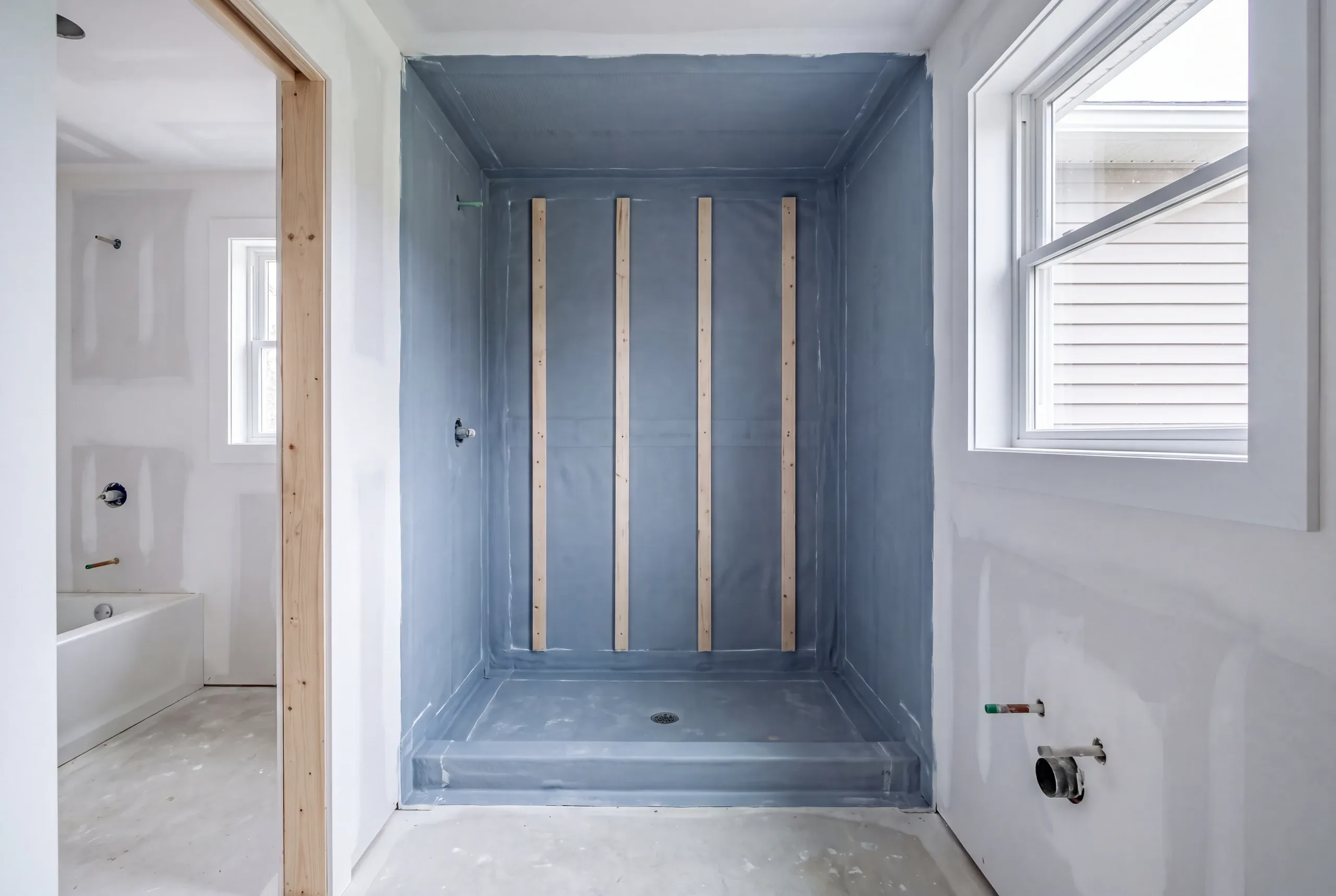 Waterproofing and blocking installed before tile in an Oakland shower