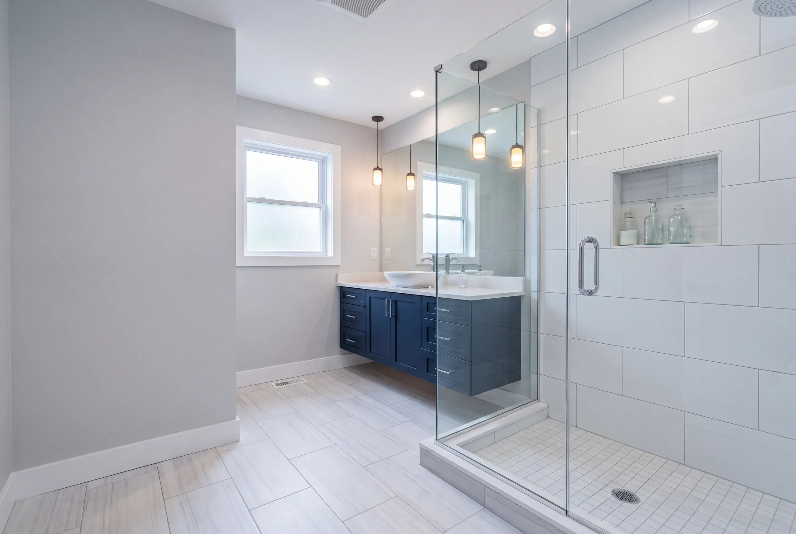 Finished bathroom in a Sidney, Maine home, wide interior view