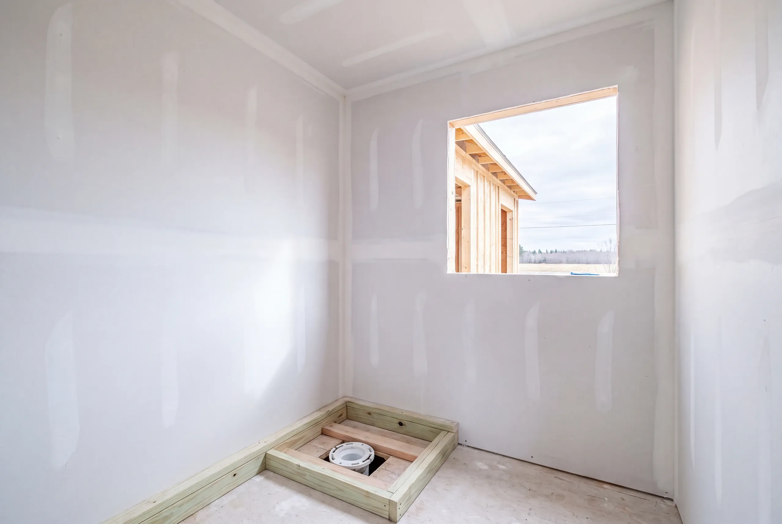 Subfloor replaced around a toilet flange in a Vassalboro bathroom