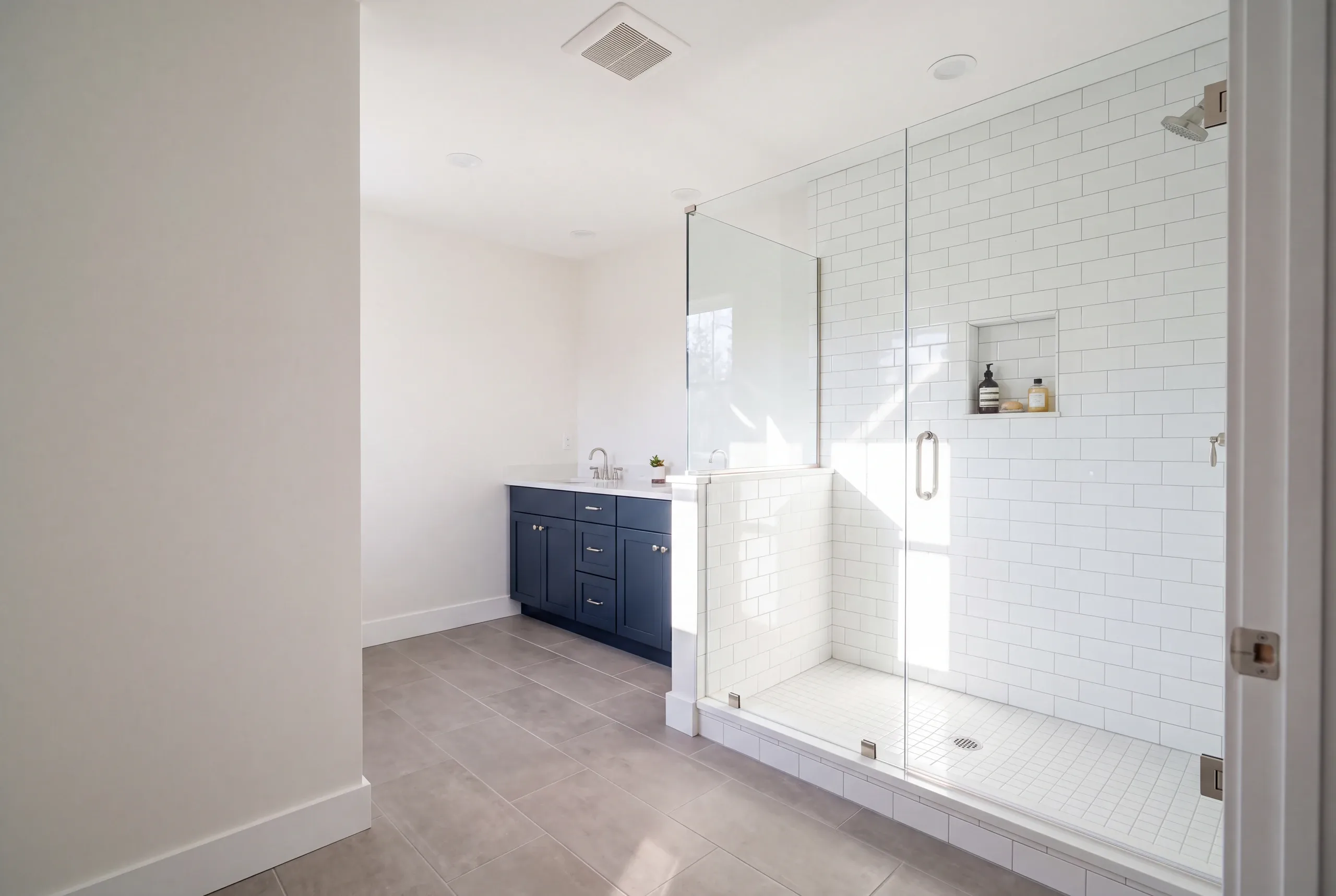 Finished bathroom in a Vassalboro, Maine home, wide interior view