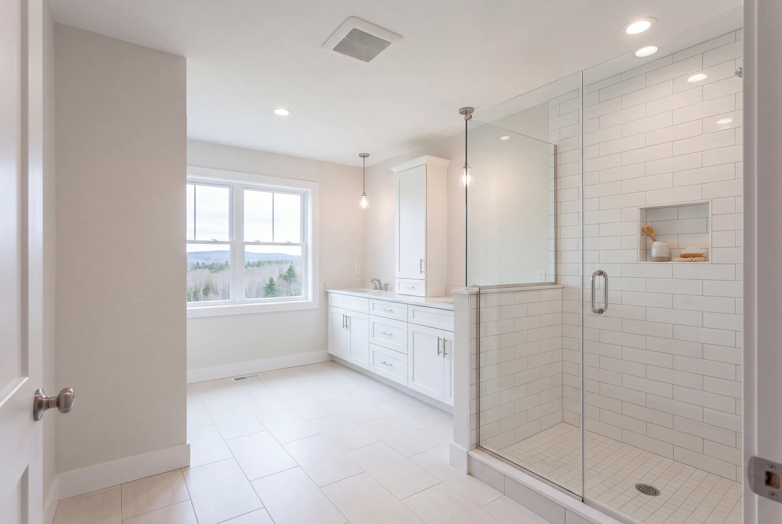 Finished bathroom in a Vienna, Maine home, wide interior view