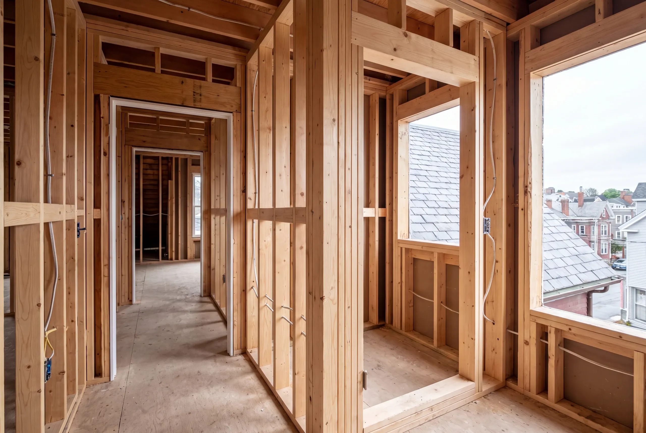 Second-floor bathroom framing opened in a Waterville home near Colby College