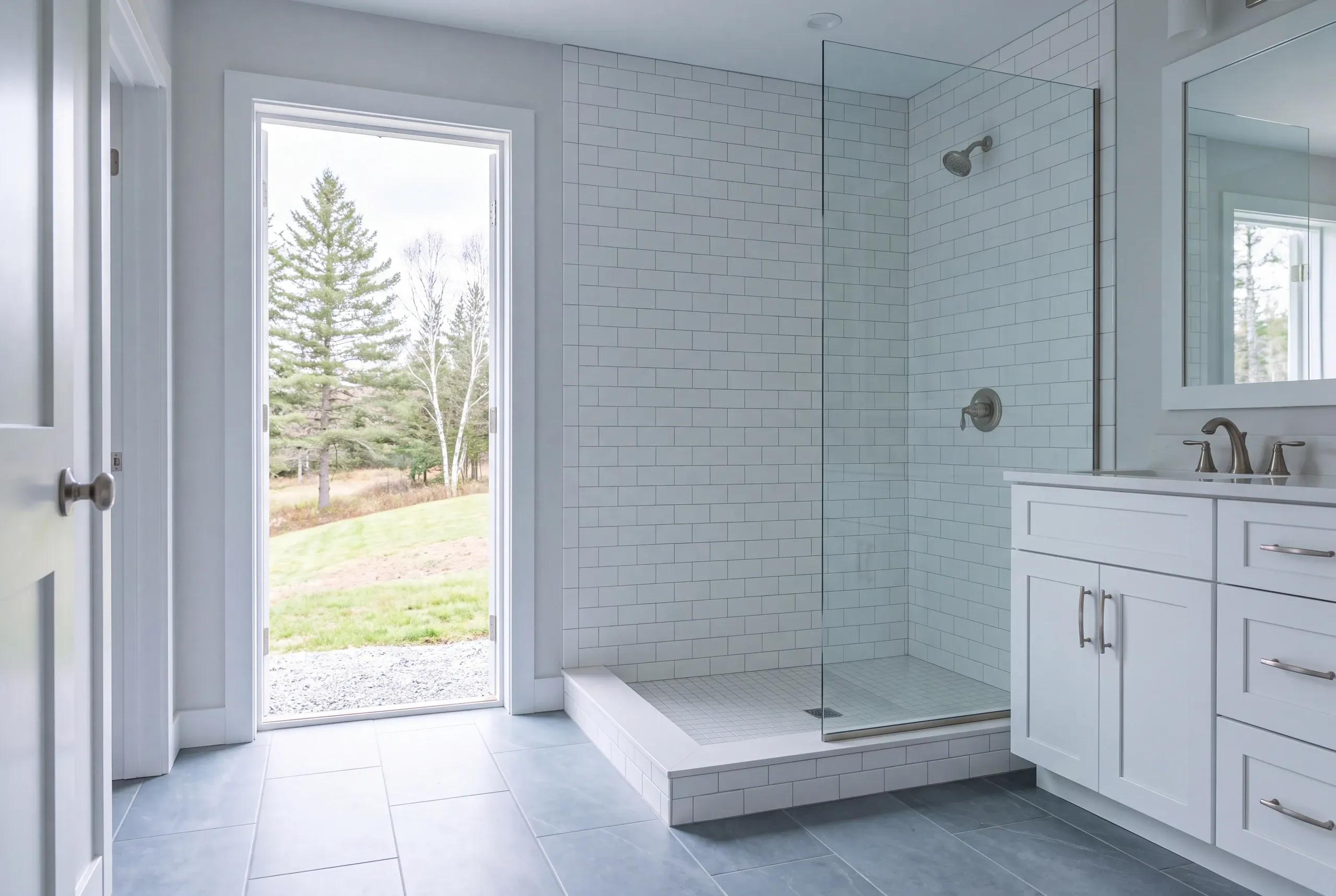 Whitefield farmhouse bathroom taken back to studs and joists