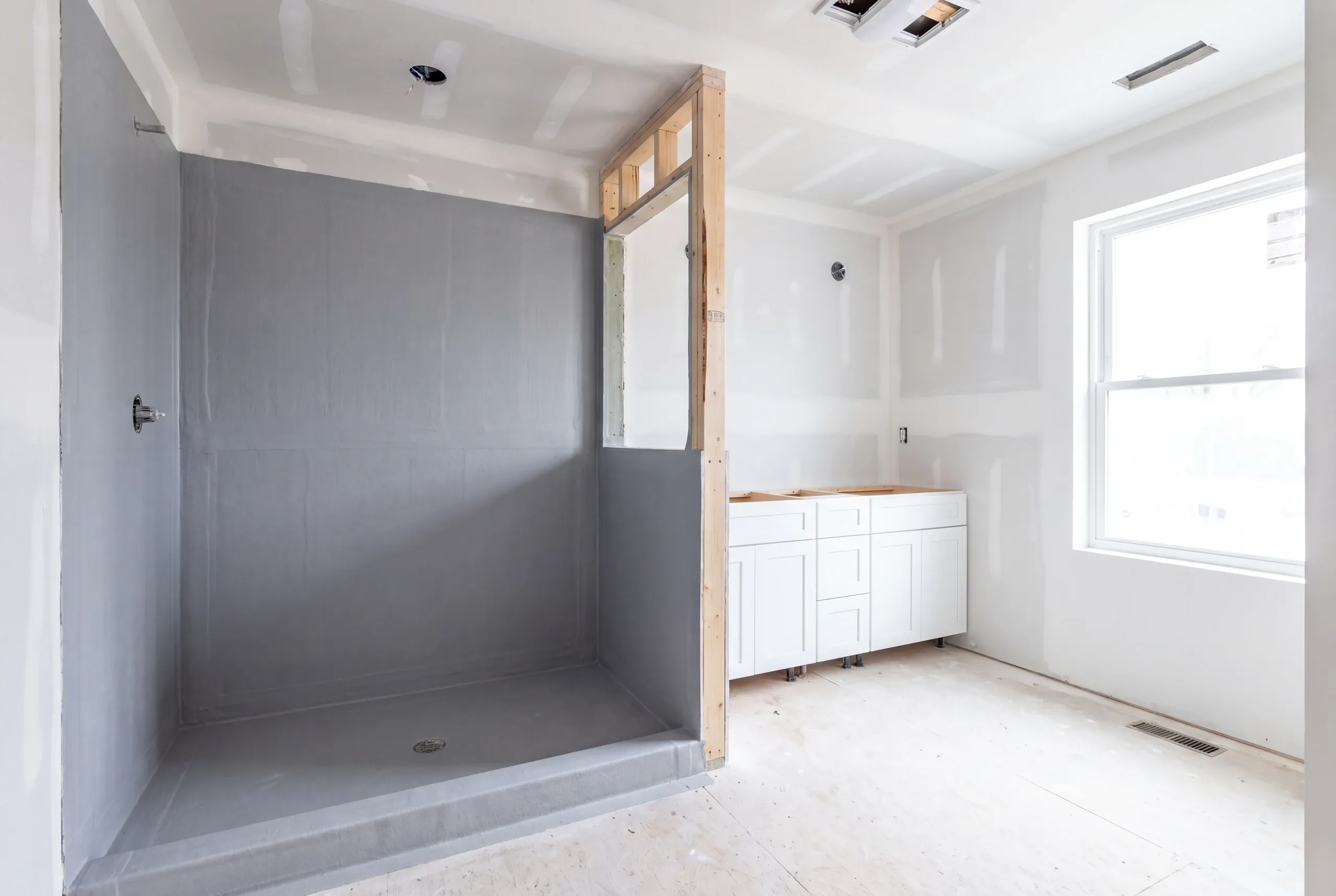 Waterproofing membrane applied before tile in a Winslow shower