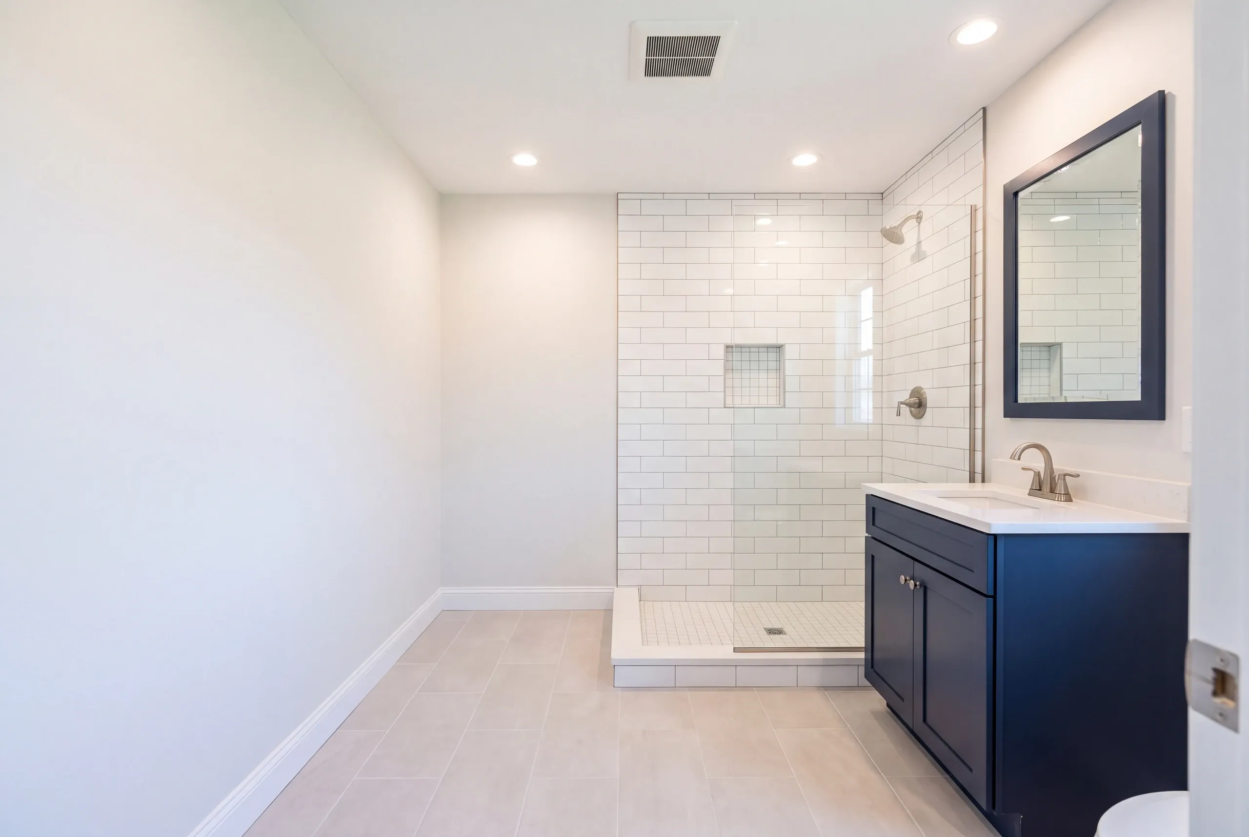 Finished bathroom in a Winslow, Maine home, wide interior view