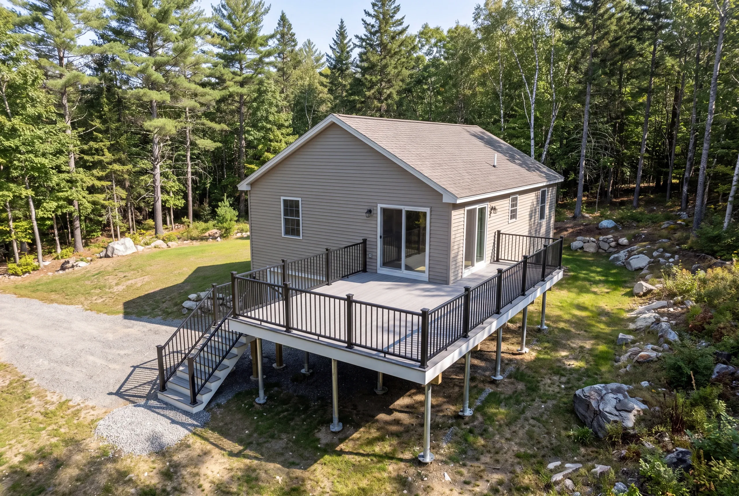 Lumber delivered on a gravel road to a Vienna deck build