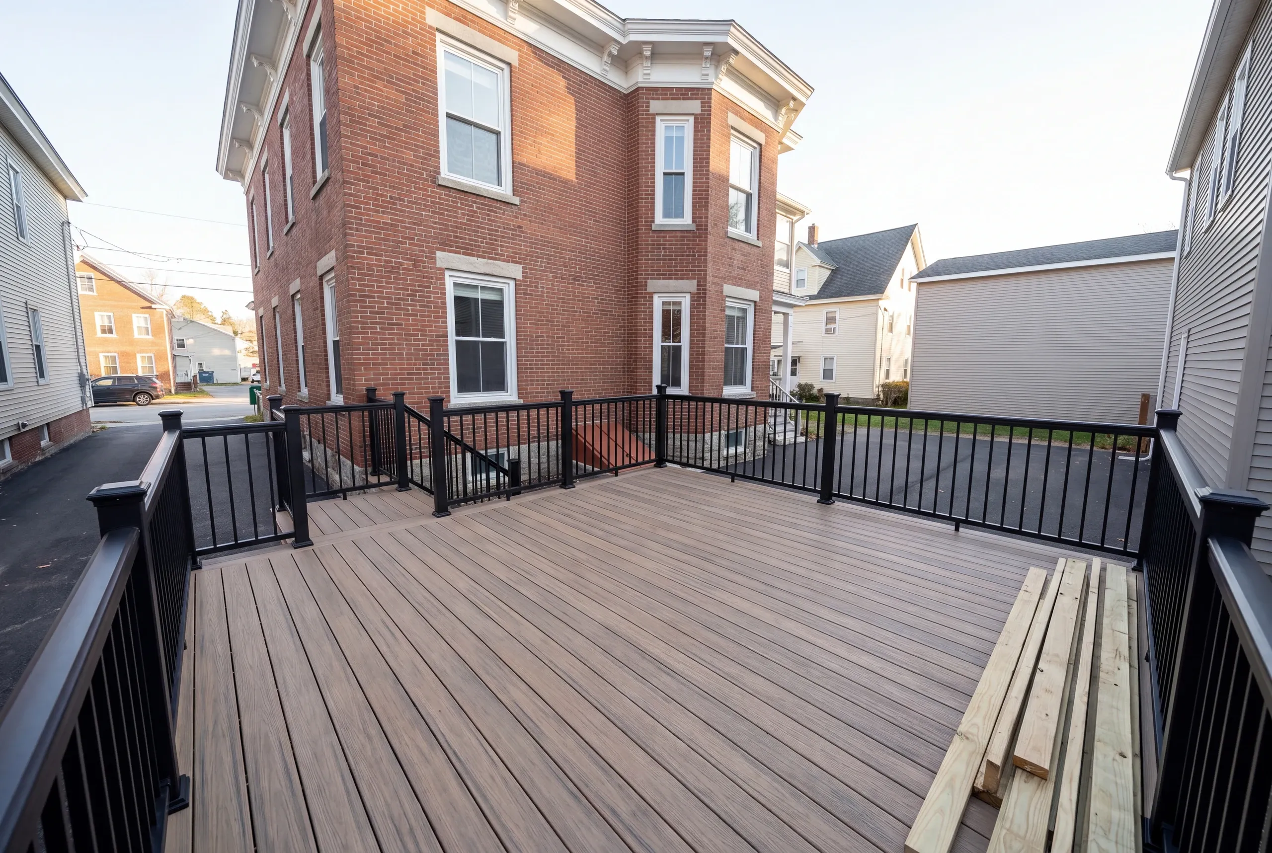 Aluminum railing sections set on a finished Waterville deck