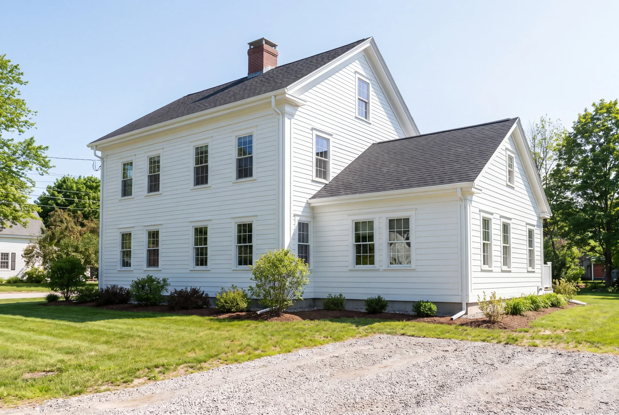Historic Gardiner home with a new kitchen addition set back from the street elevation