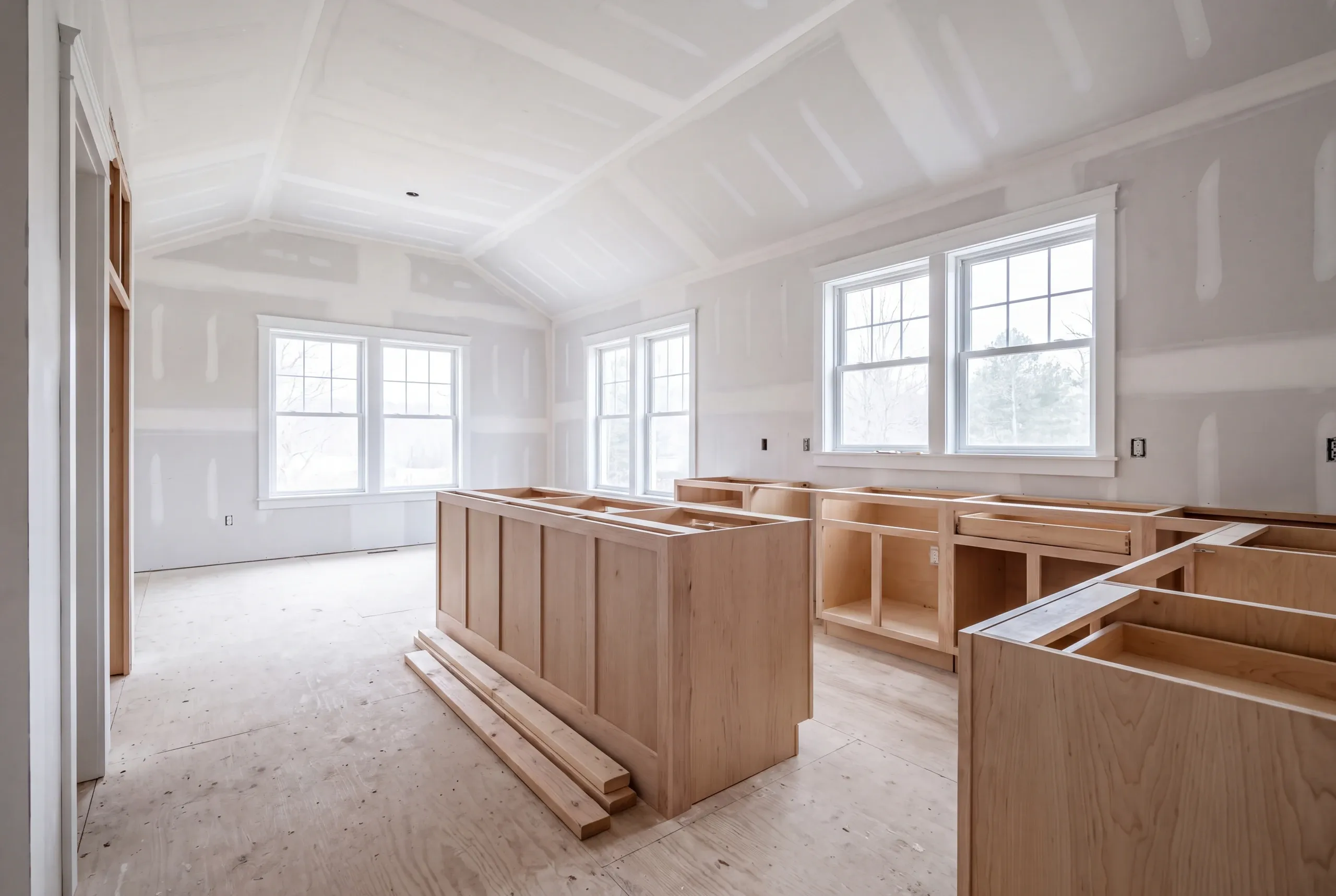 Island cabinets and counter set in a rural Auburn, Maine farmhouse