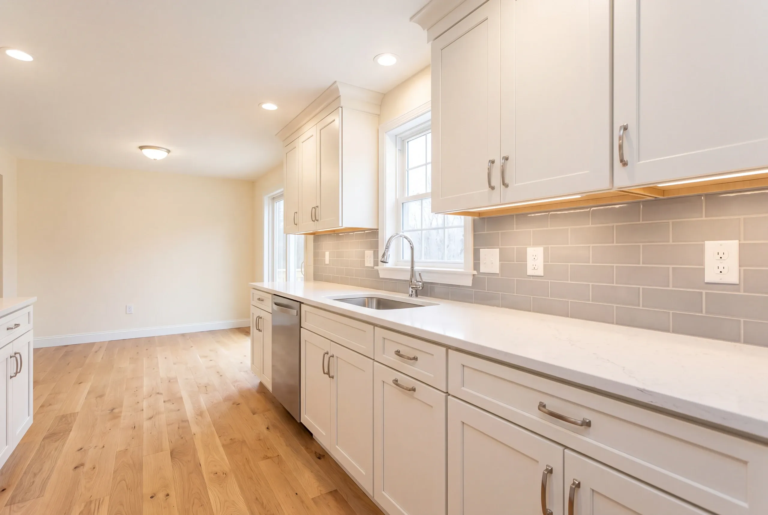 Finished kitchen in an Auburn, Maine home, wide interior view