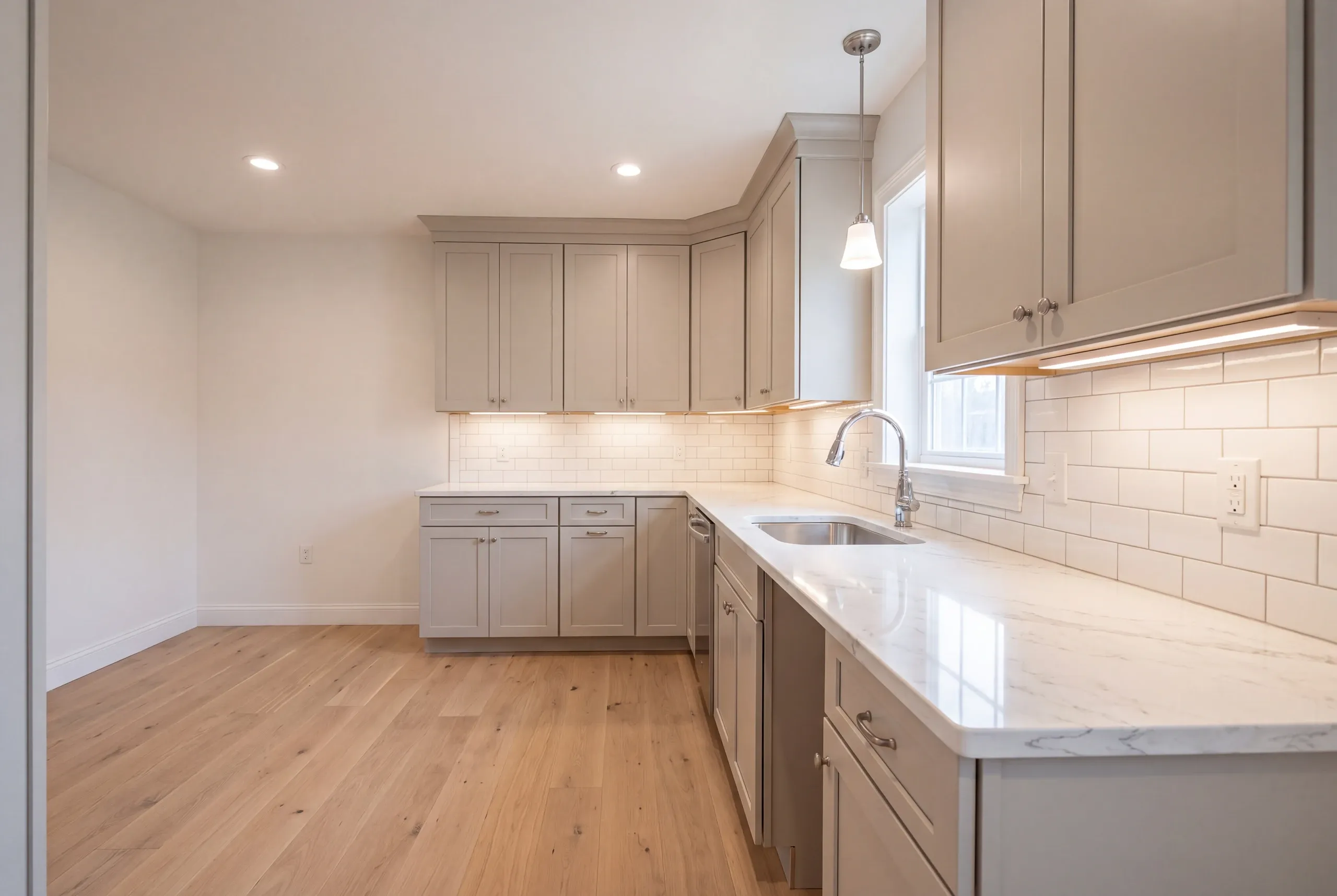 Finished kitchen in an Augusta, Maine home, wide interior view
