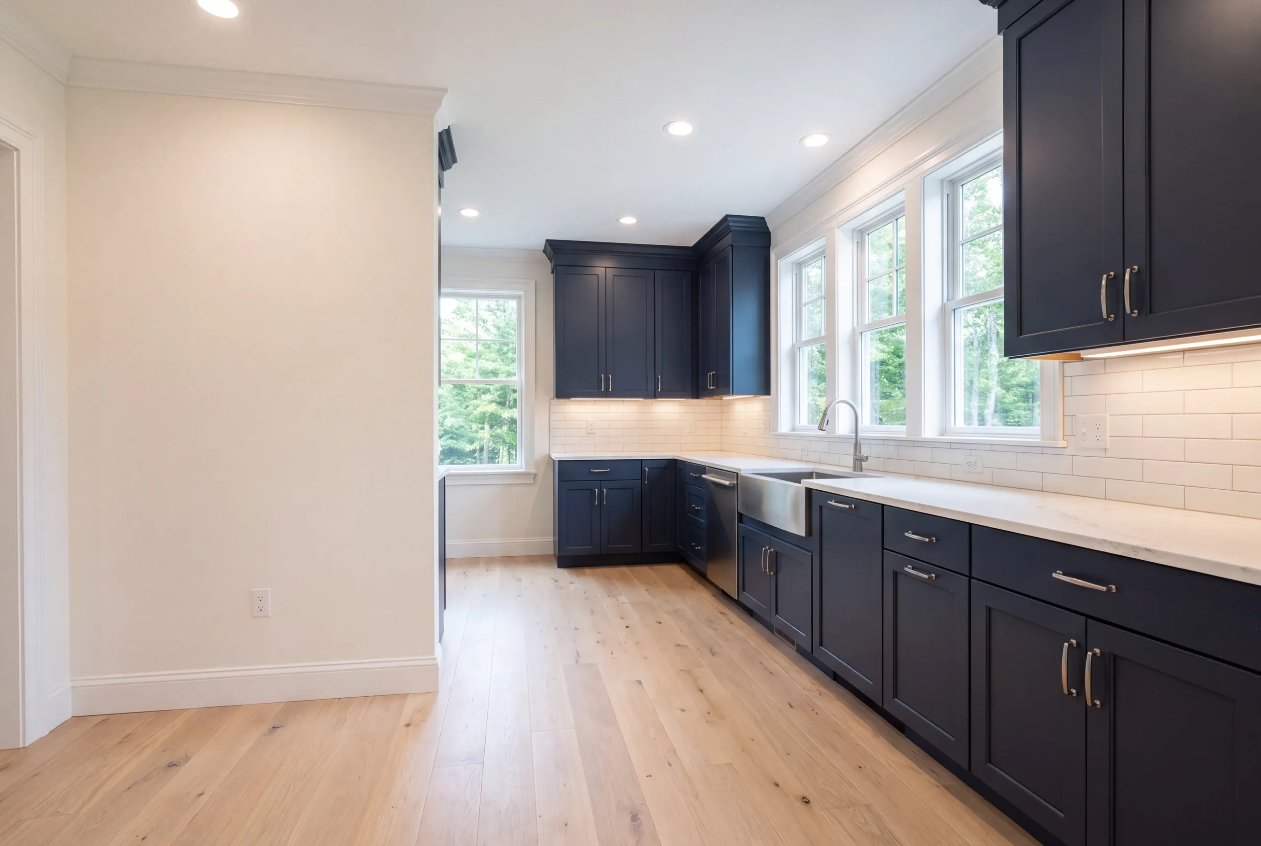 Finished kitchen in a Gardiner, Maine home, wide interior view