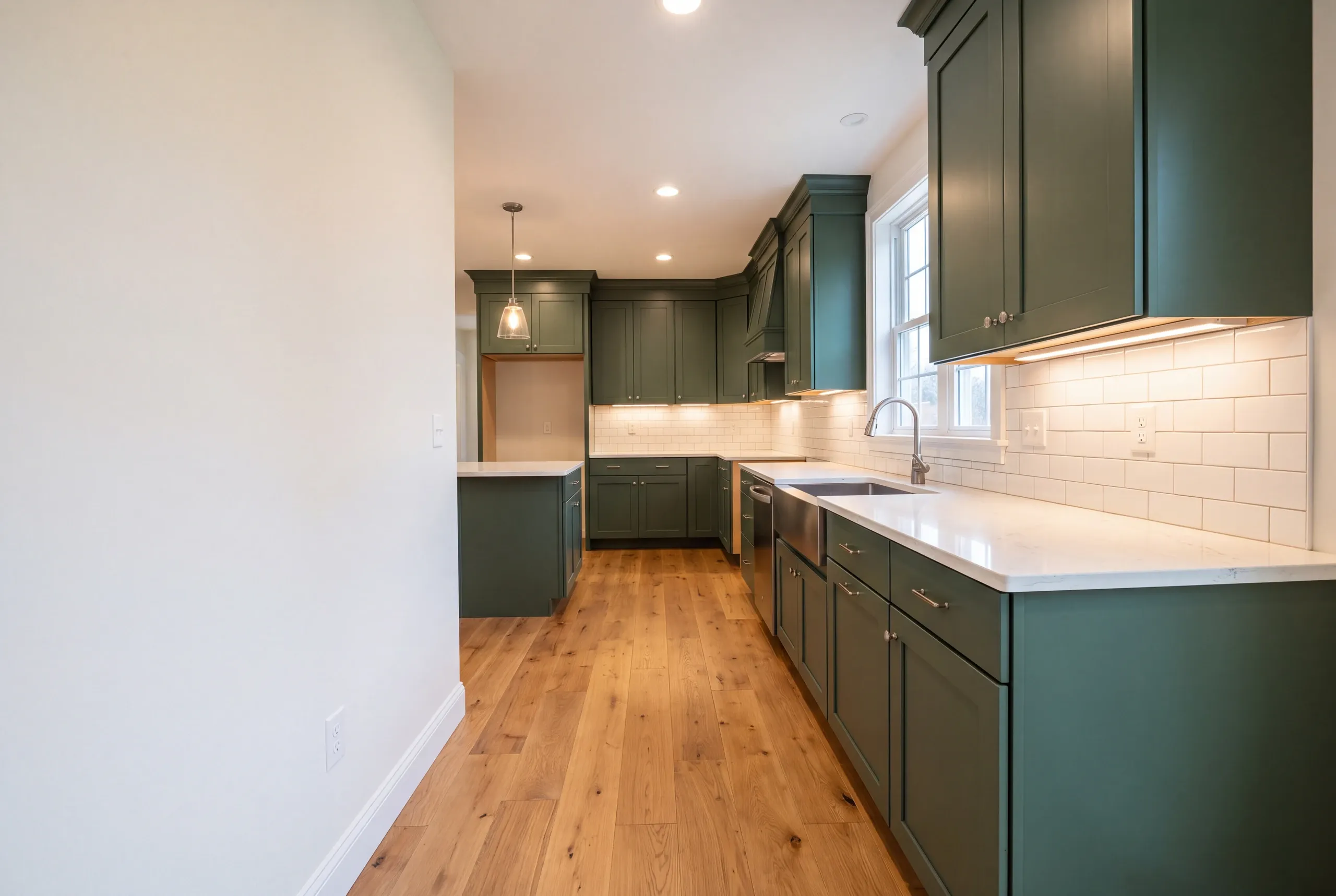Finished kitchen in a Mt Vernon, Maine home, wide interior view