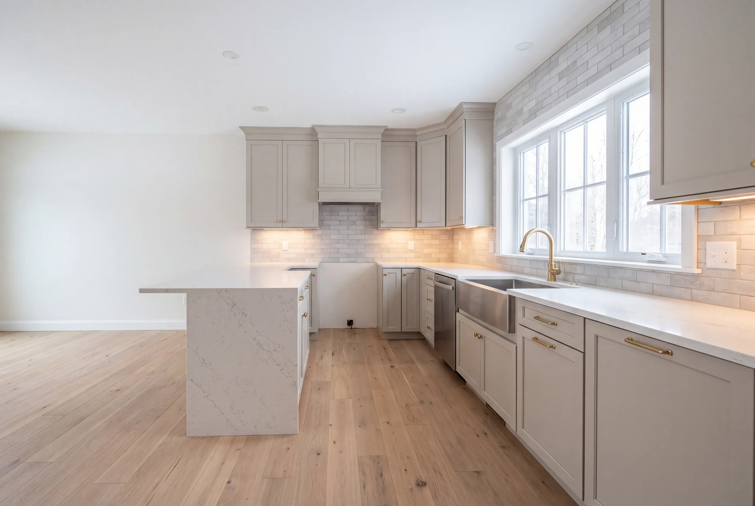 Finished kitchen in a Sidney, Maine home, wide interior view