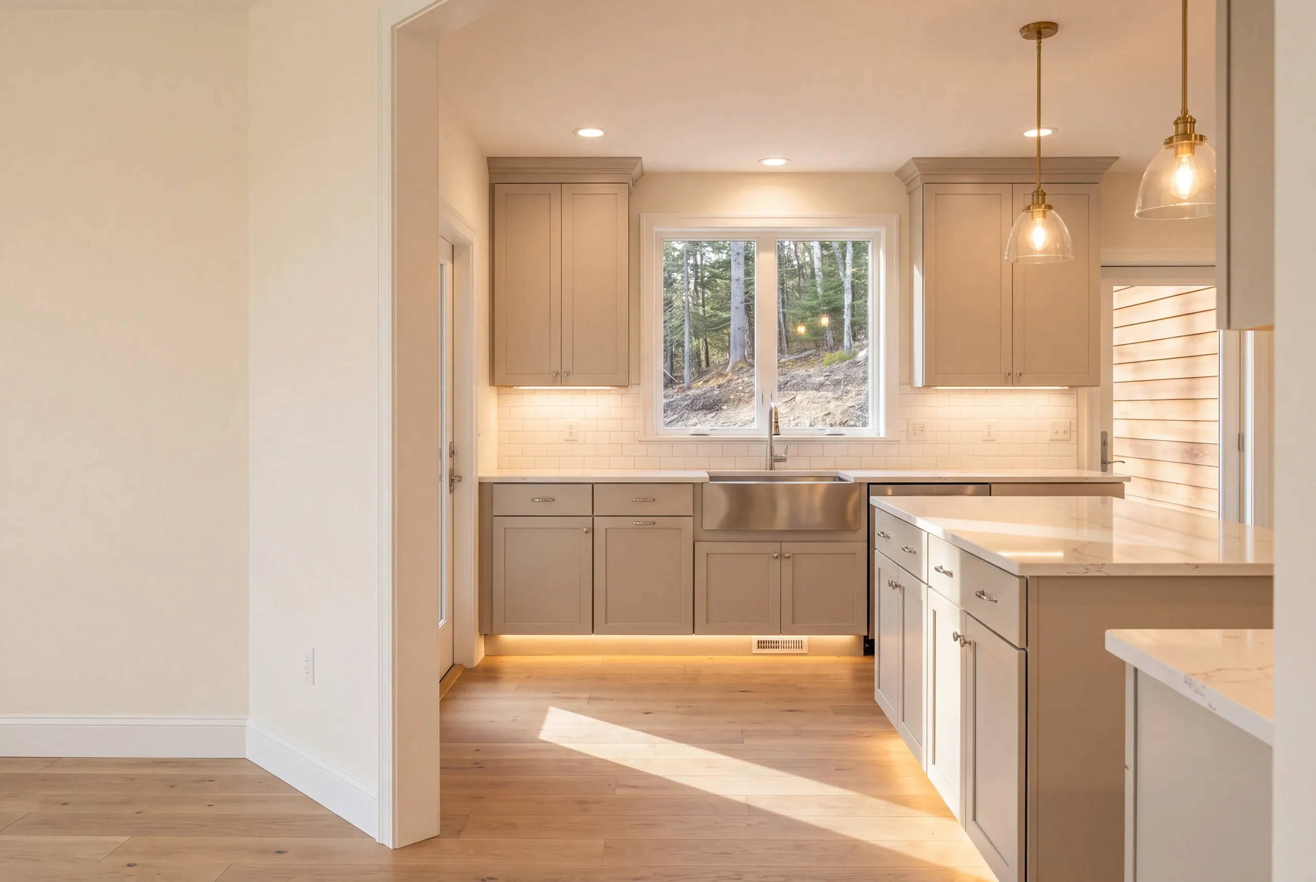 Finished kitchen in a Vienna, Maine home, wide interior view