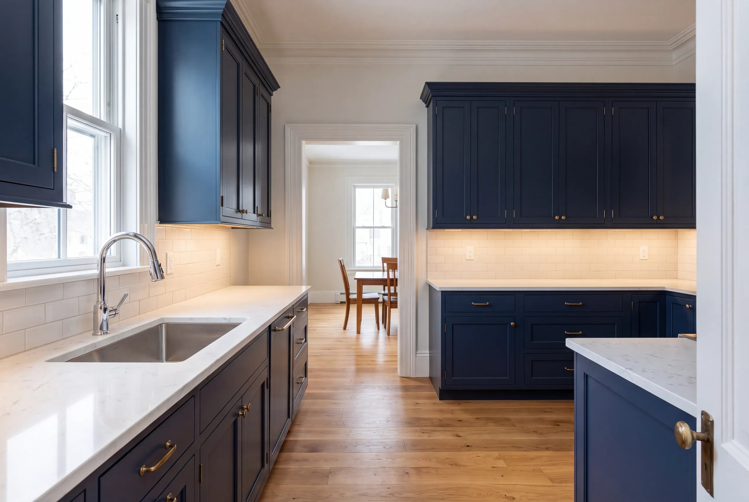 Finished Victorian kitchen with quartz counters in Waterville, Maine