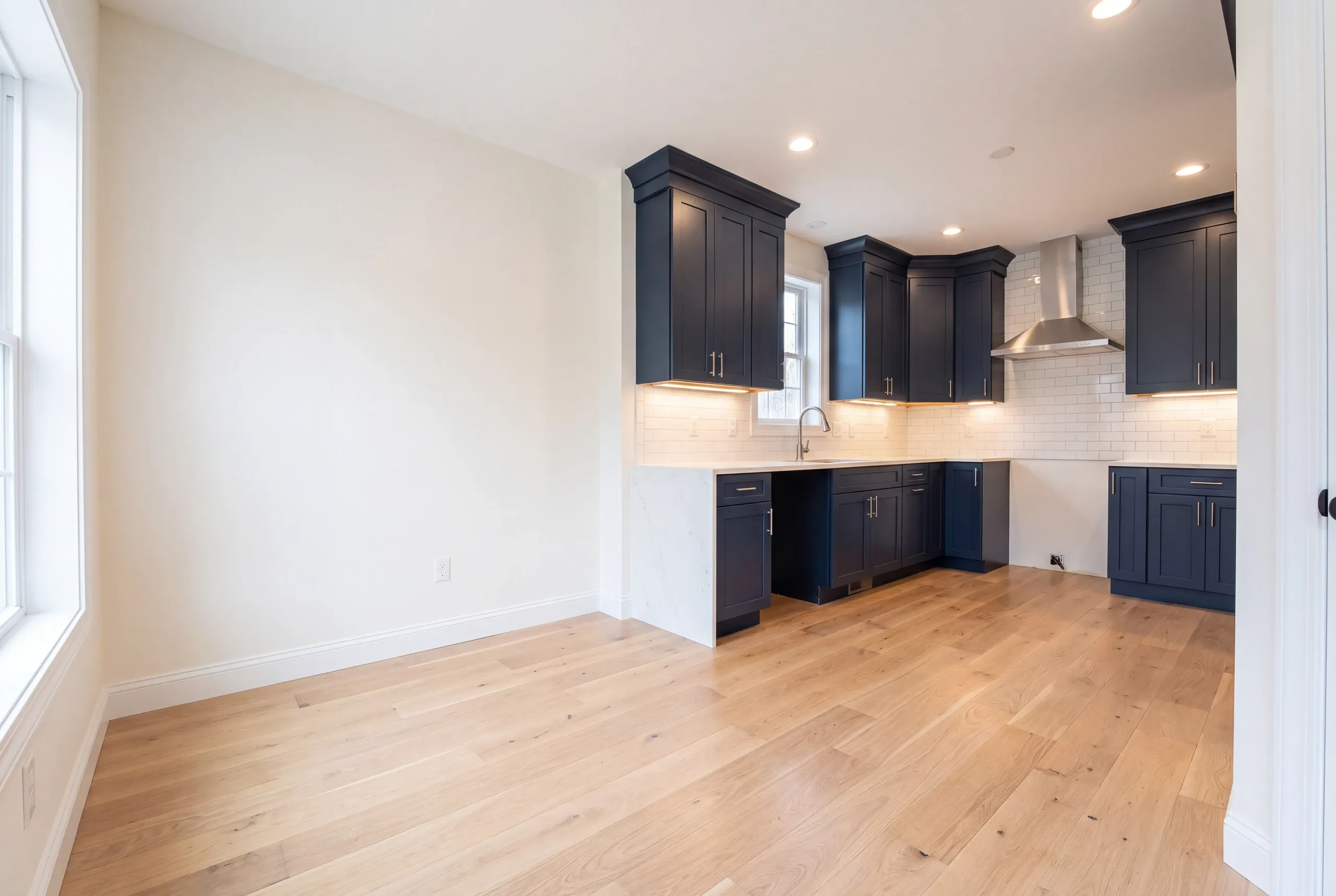 Finished kitchen in a Winslow, Maine home, wide interior view
