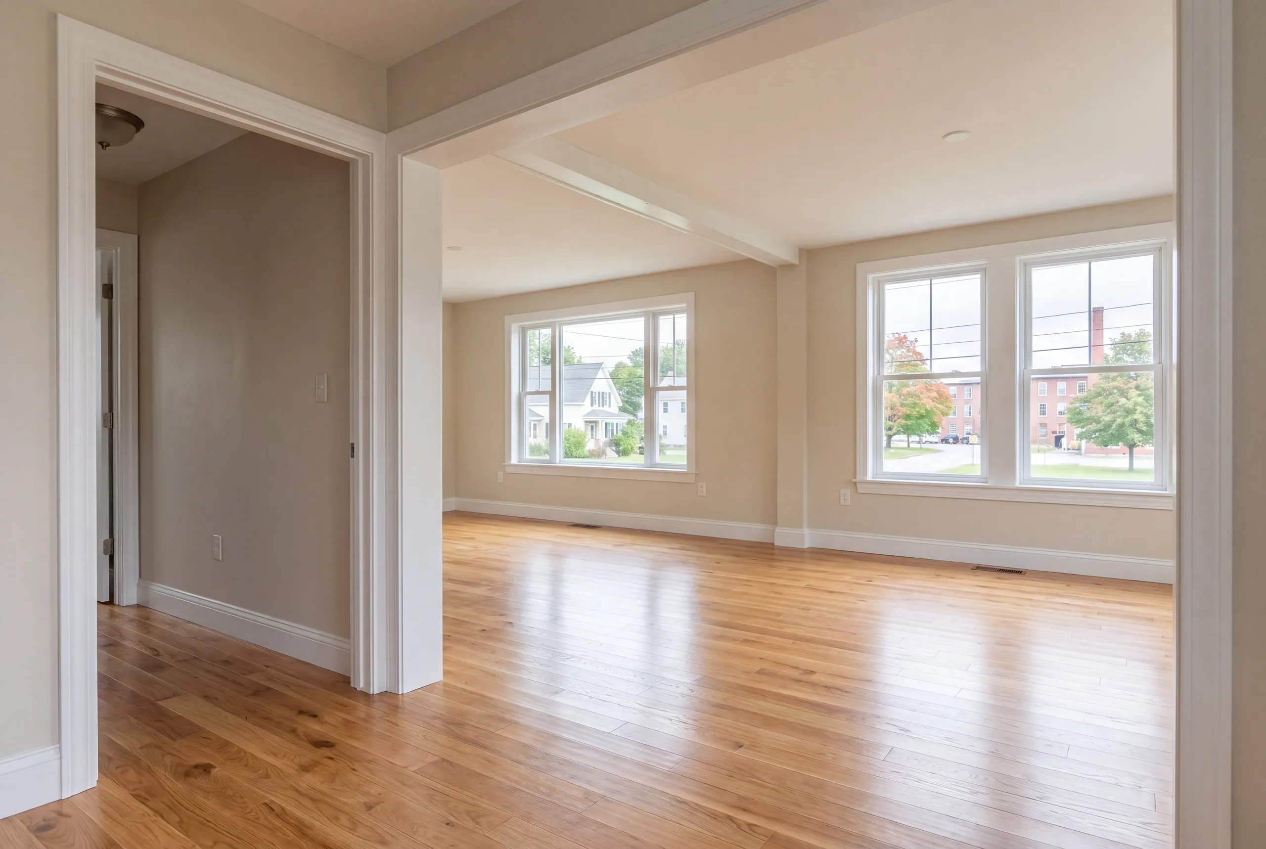 Finished renovated living room in an Auburn home seen from the hall