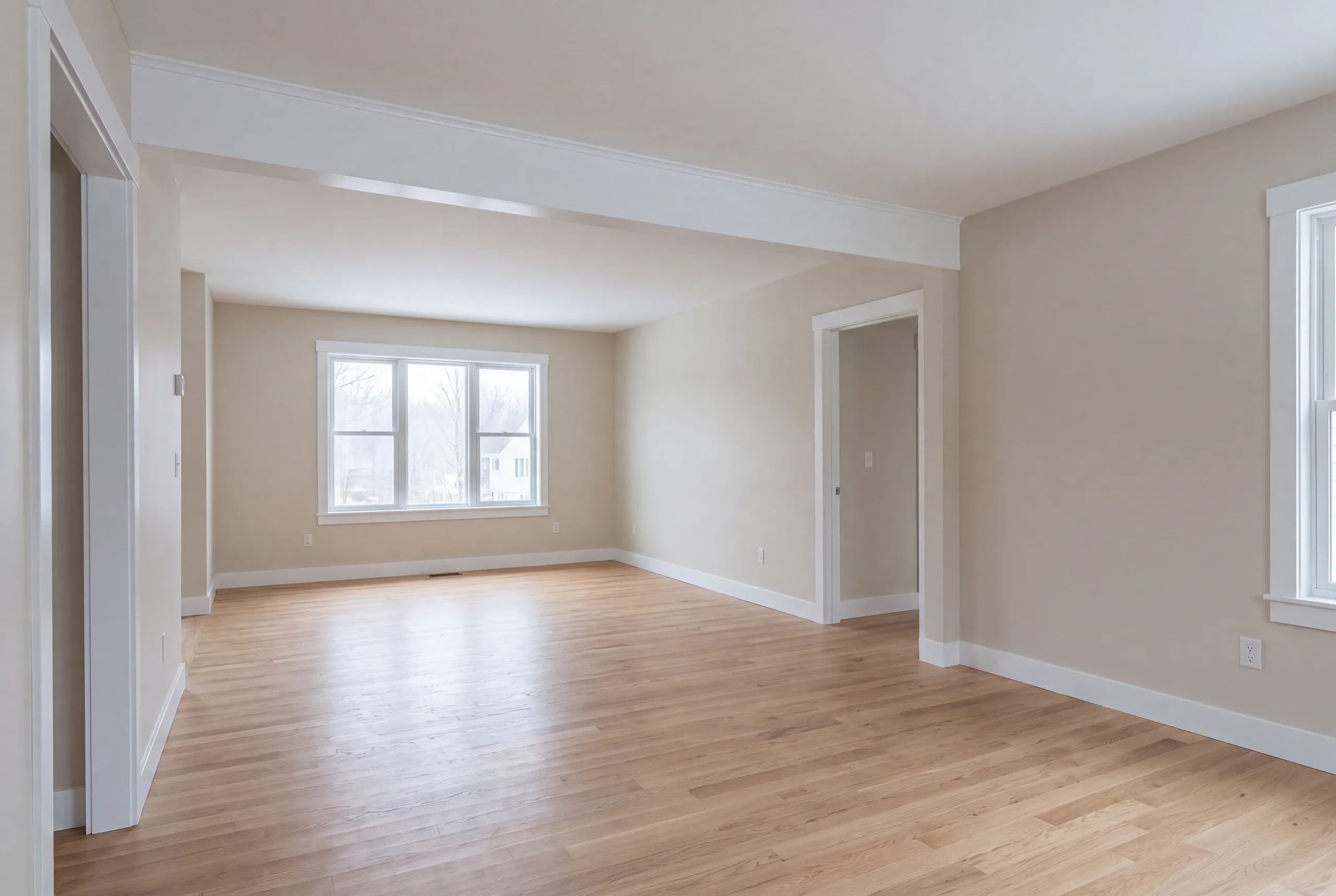 Finished renovated living room in an Augusta home seen from the hall
