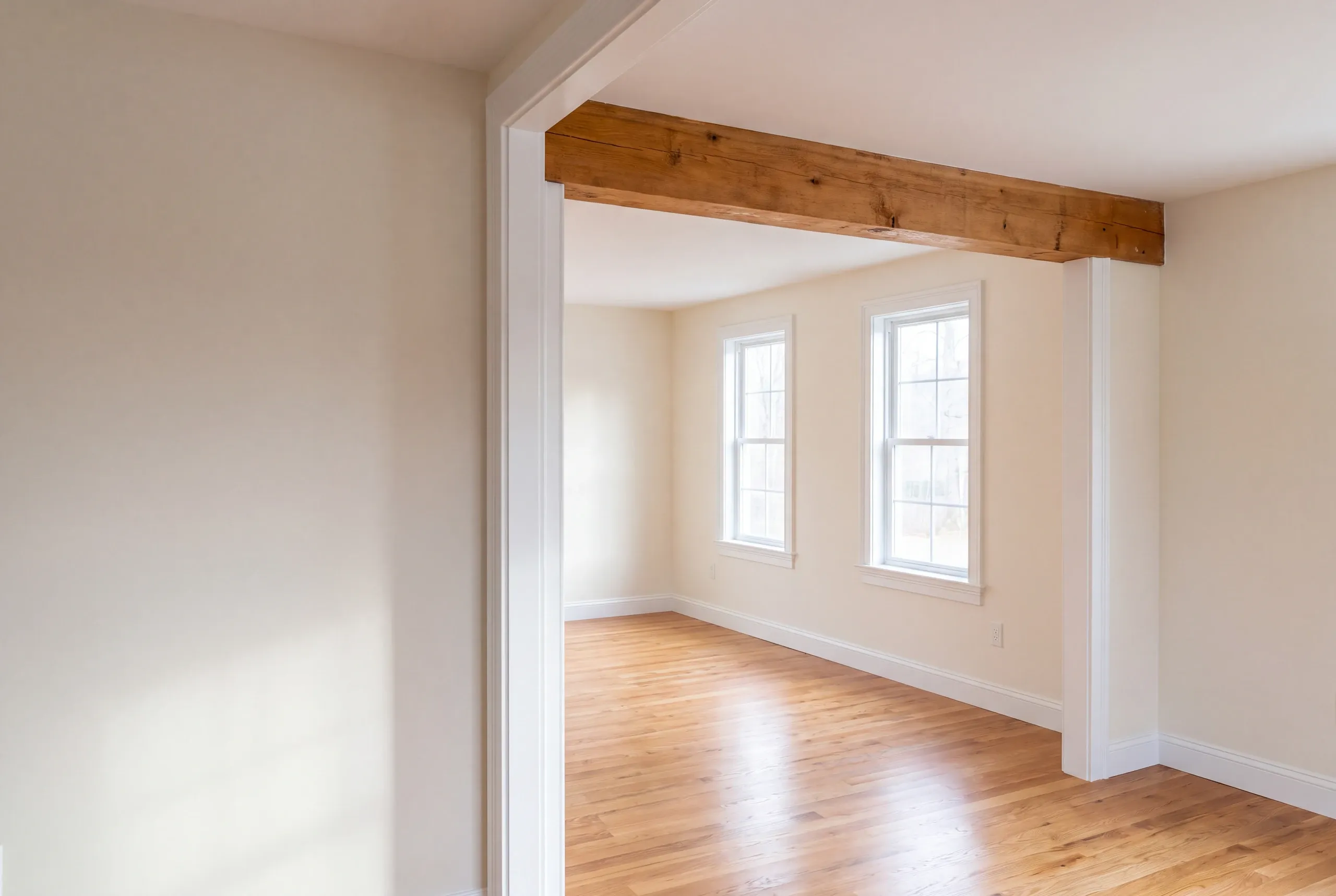 Finished renovated living space in a Brunswick, Maine home, wide interior view