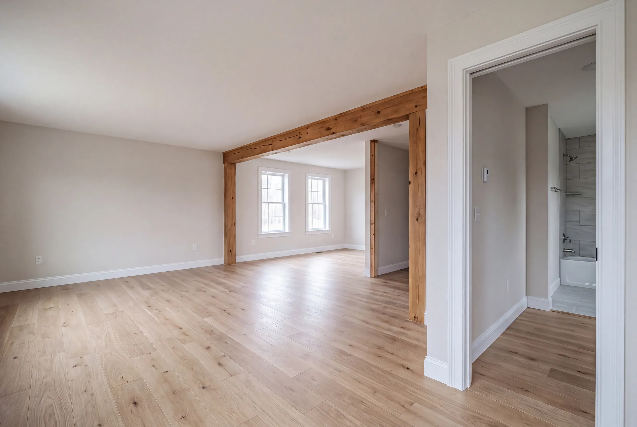 Finished renovated living space in a China, Maine home, wide interior view