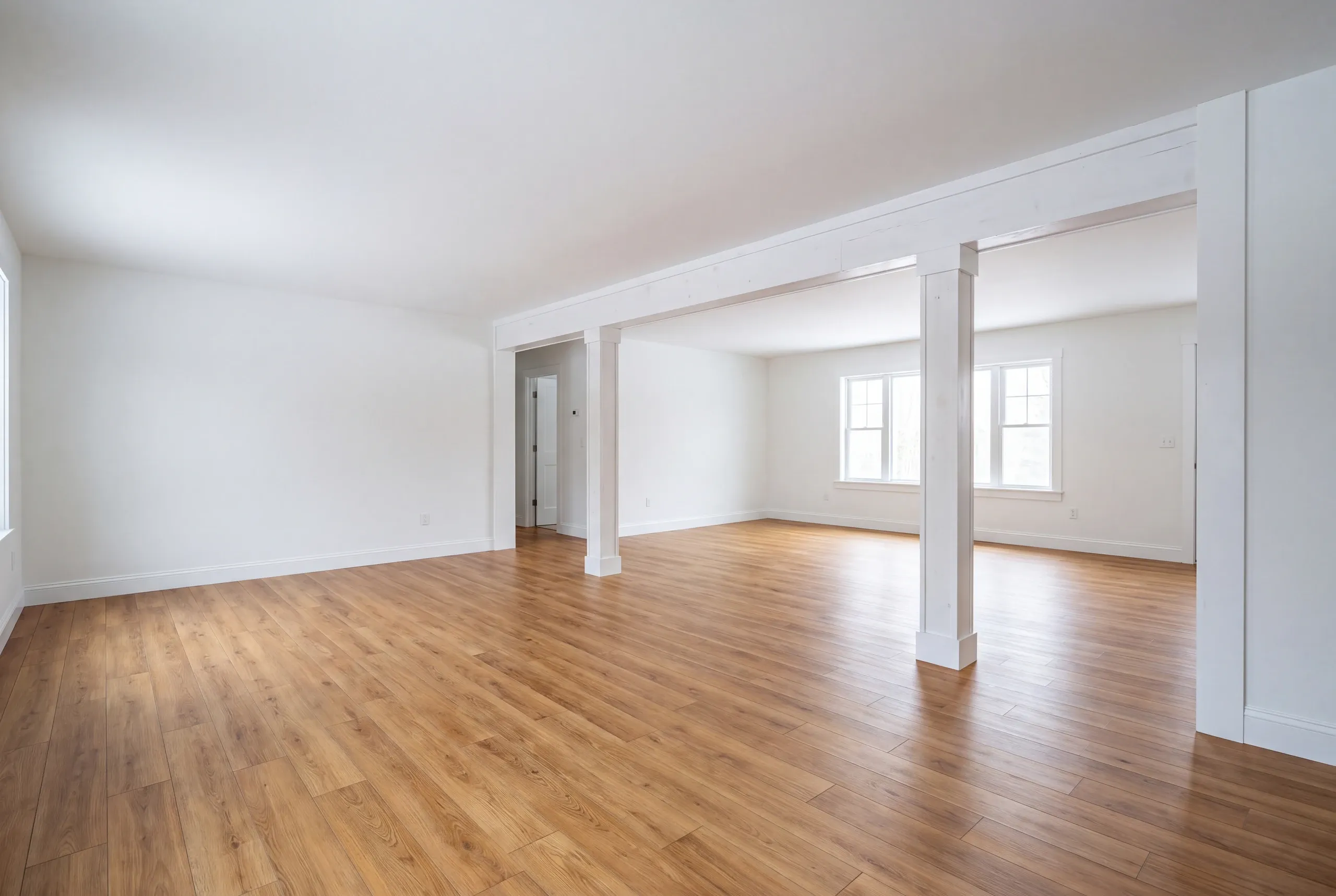 Finished renovated living space in a Central Maine home, wide interior view
