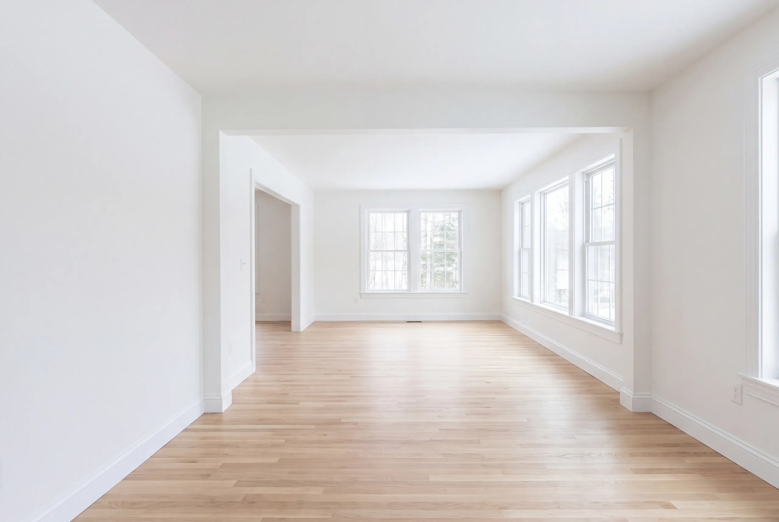 Finished renovated living space in a Fairfield, Maine home, wide interior view