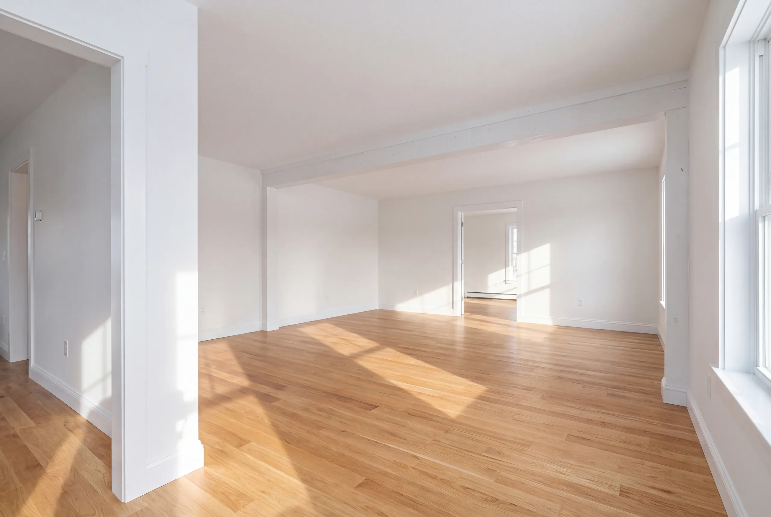 Finished renovated living room in a Greene home seen from the hall