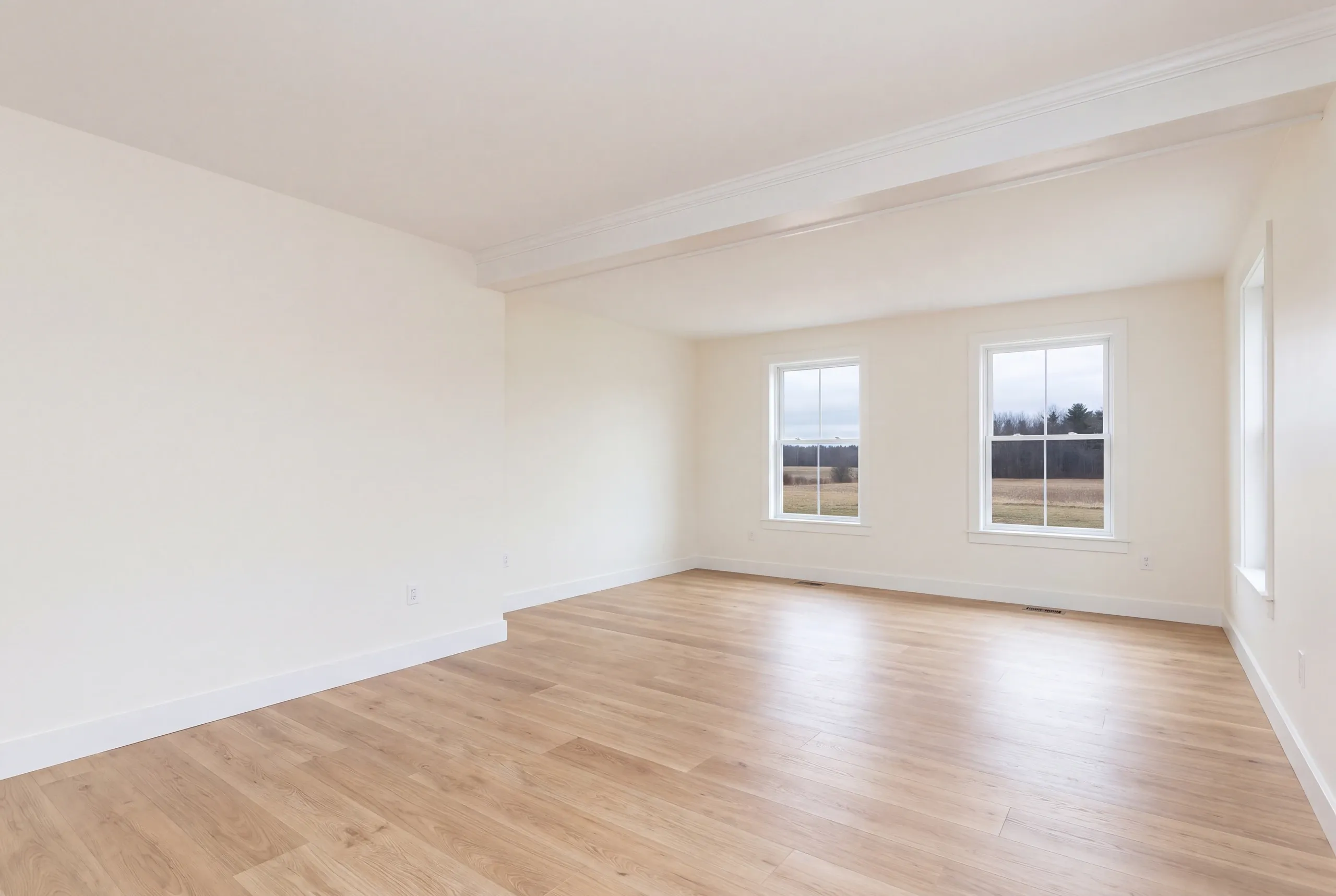 Finished renovated living space in a Greene, Maine home, wide interior view