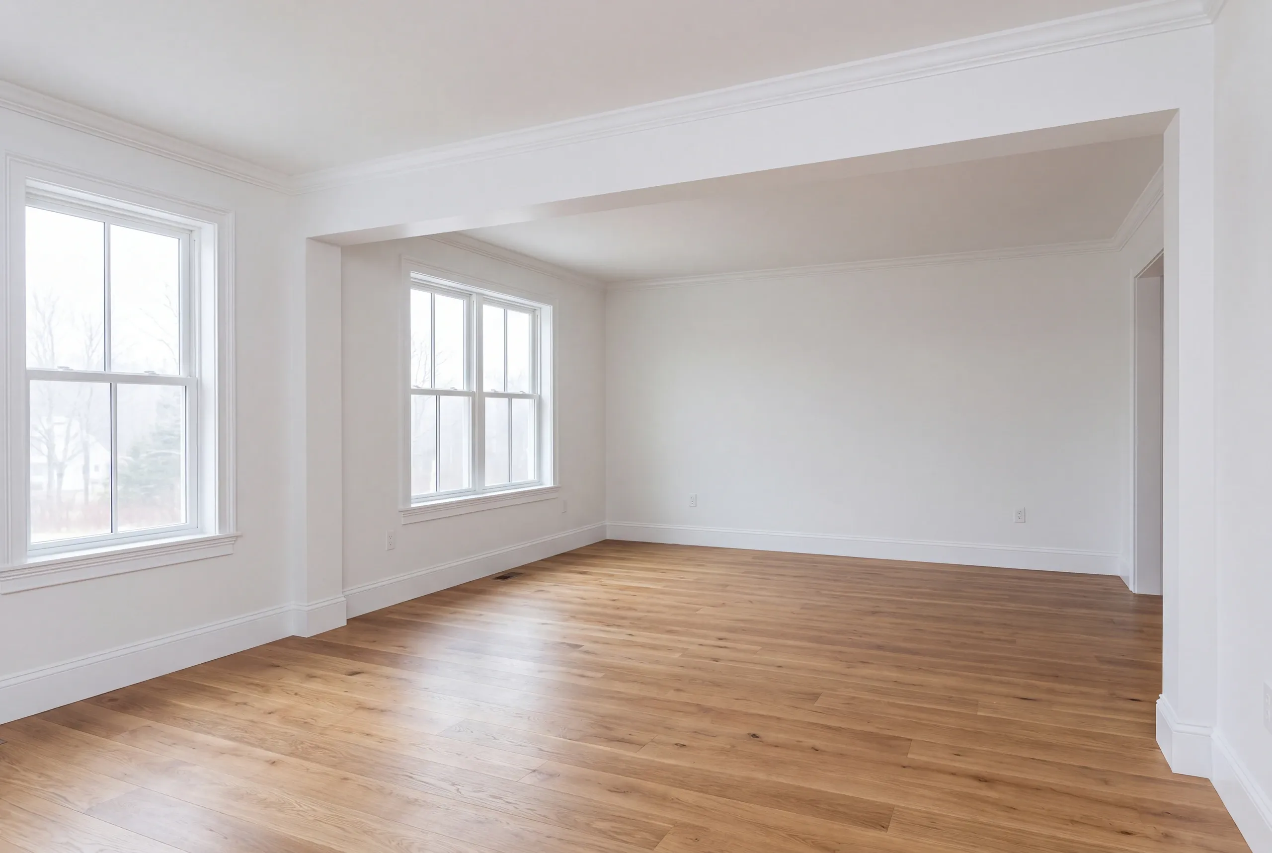 Builder reviewing a room-by-room itemized renovation contract
