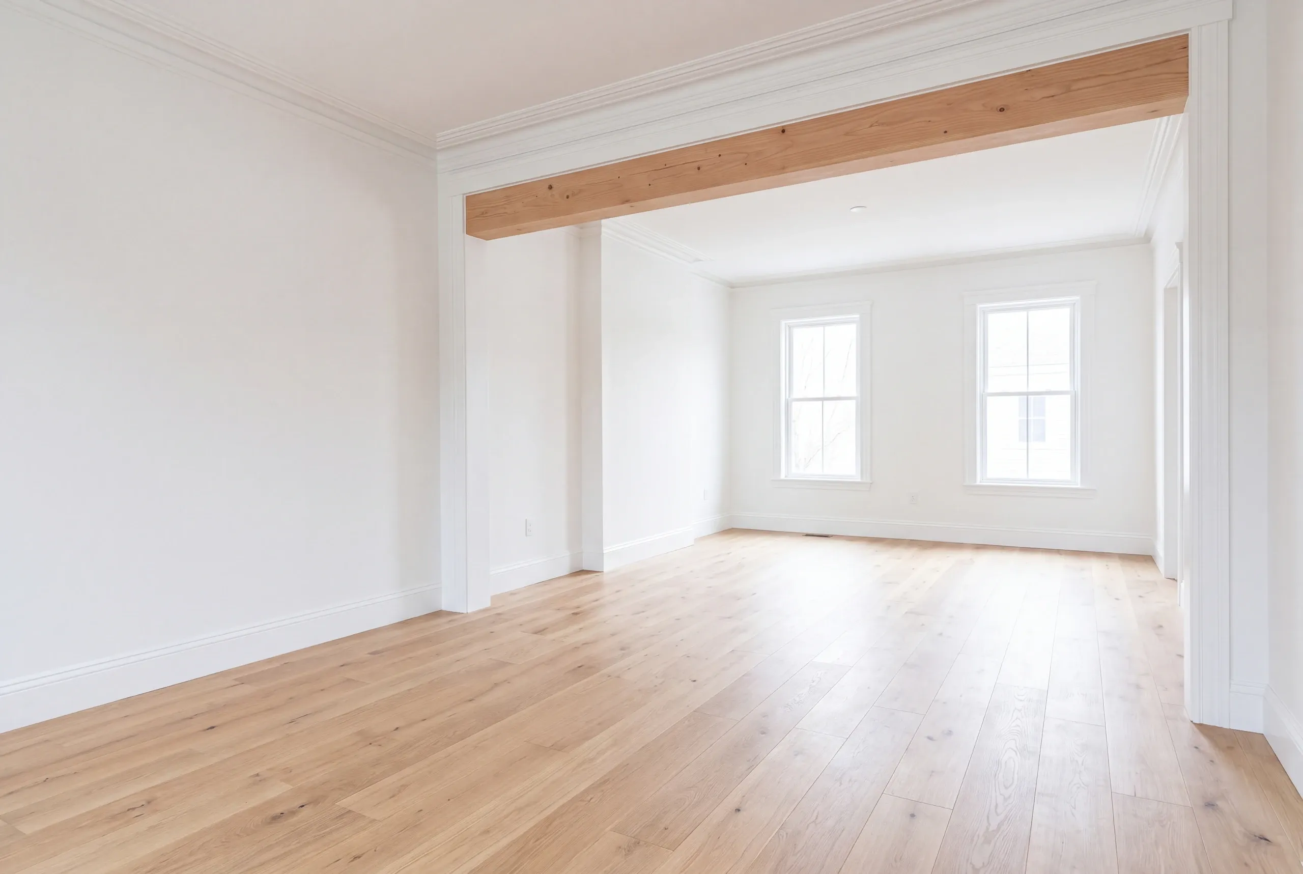 Finished renovated living space in a Lewiston, Maine home, wide interior view
