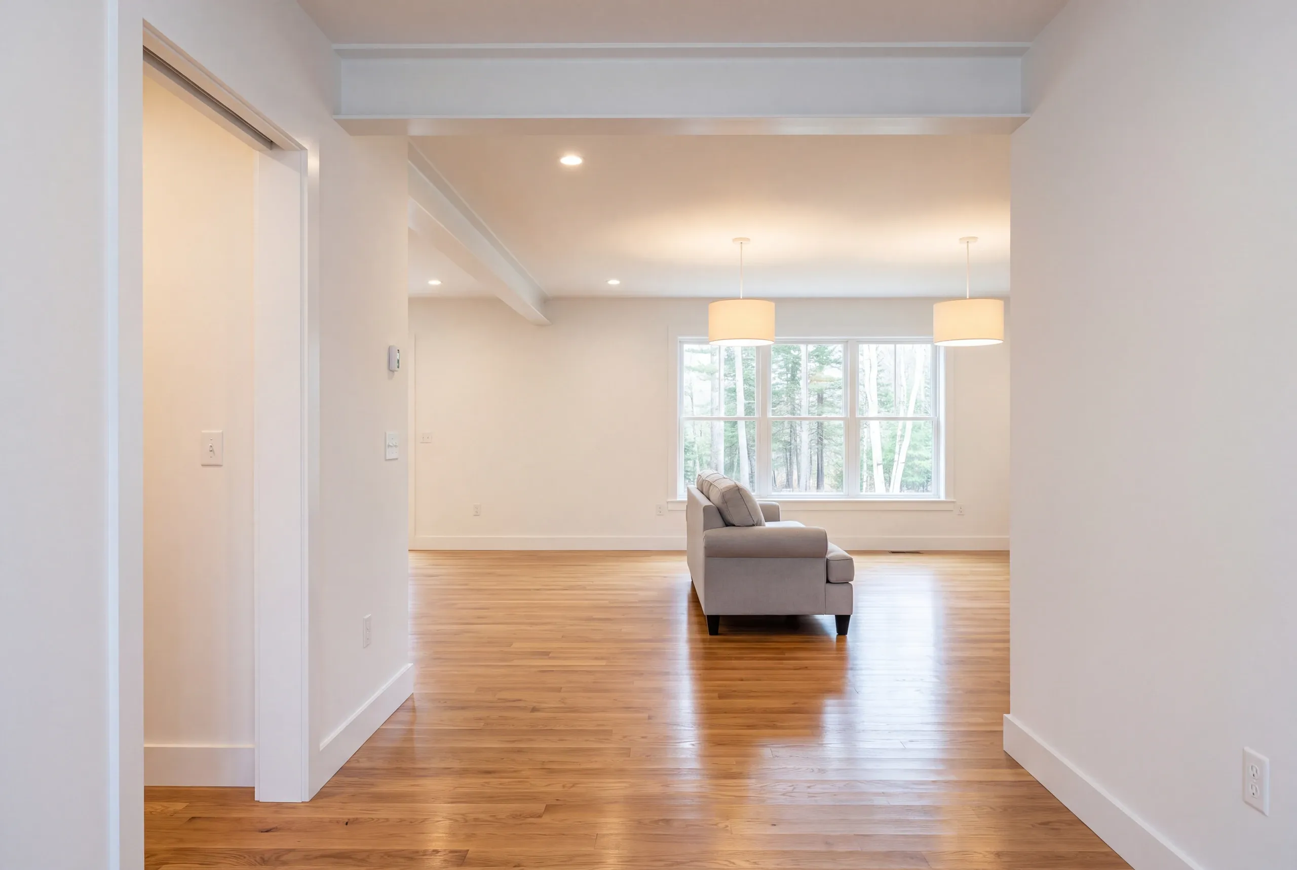 Finished renovated living room in a Mt Vernon home seen from the hall
