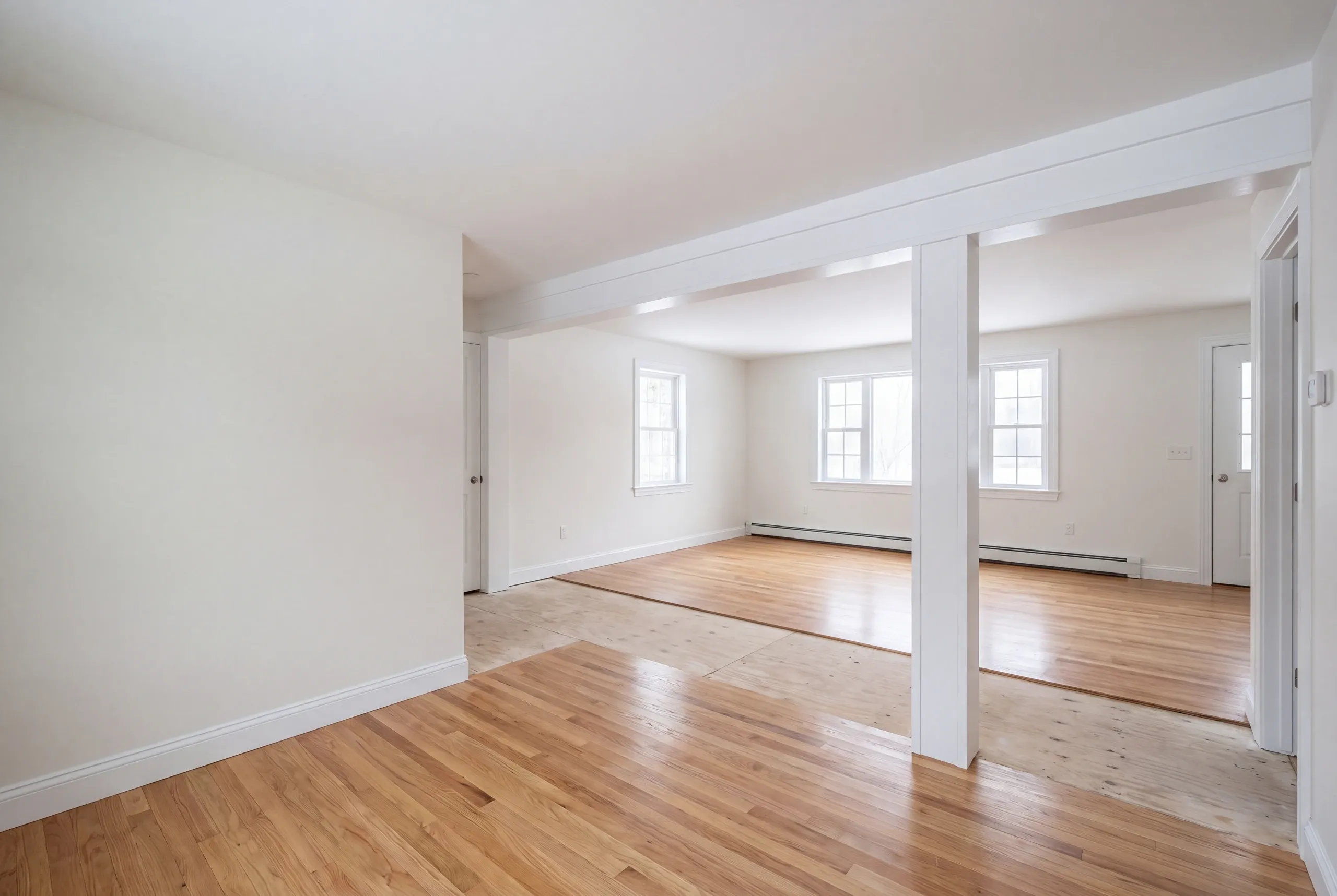 Finished renovated living space in an Oakland, Maine home, wide interior view