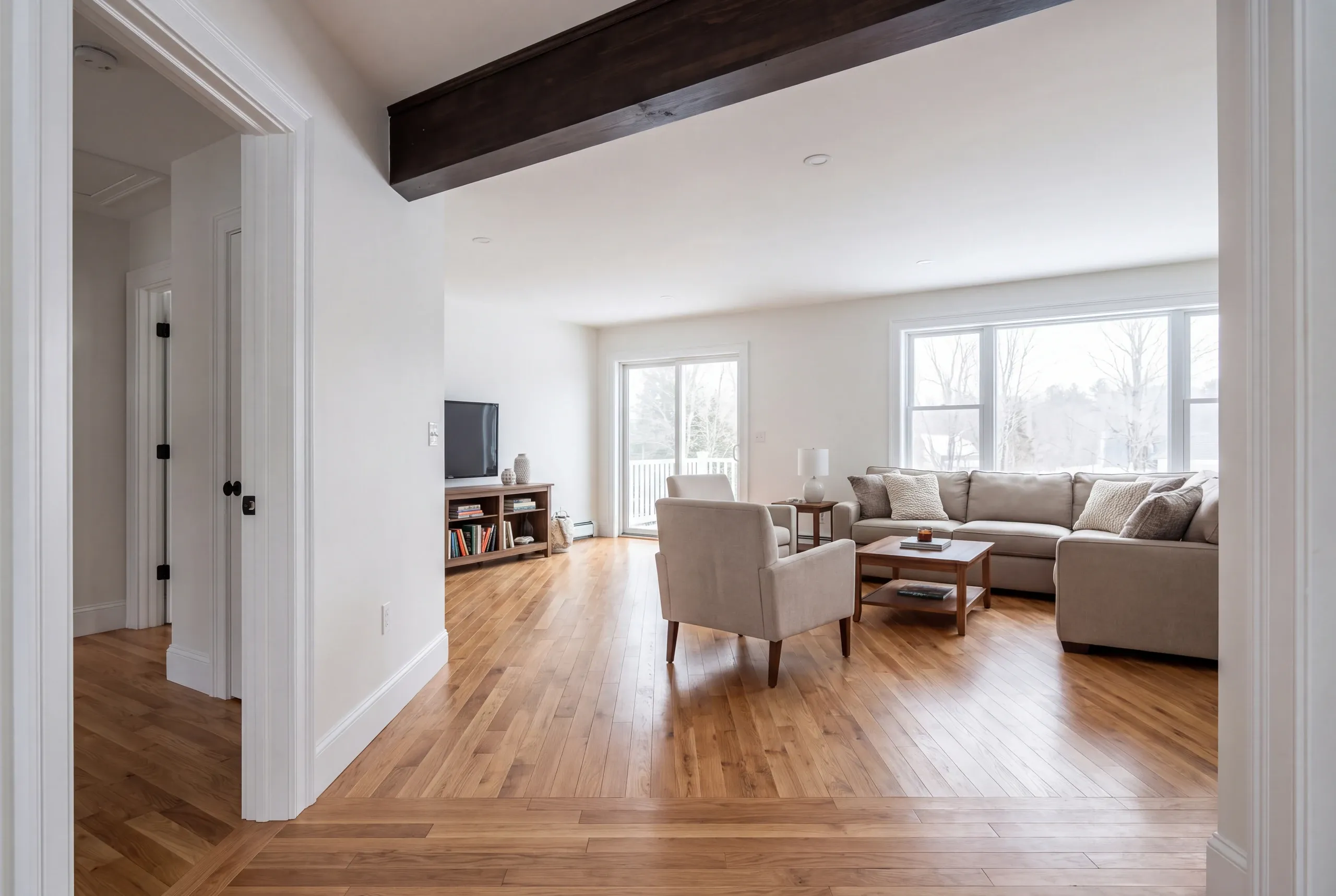 Finished renovated living room in a Sidney home seen from the hall